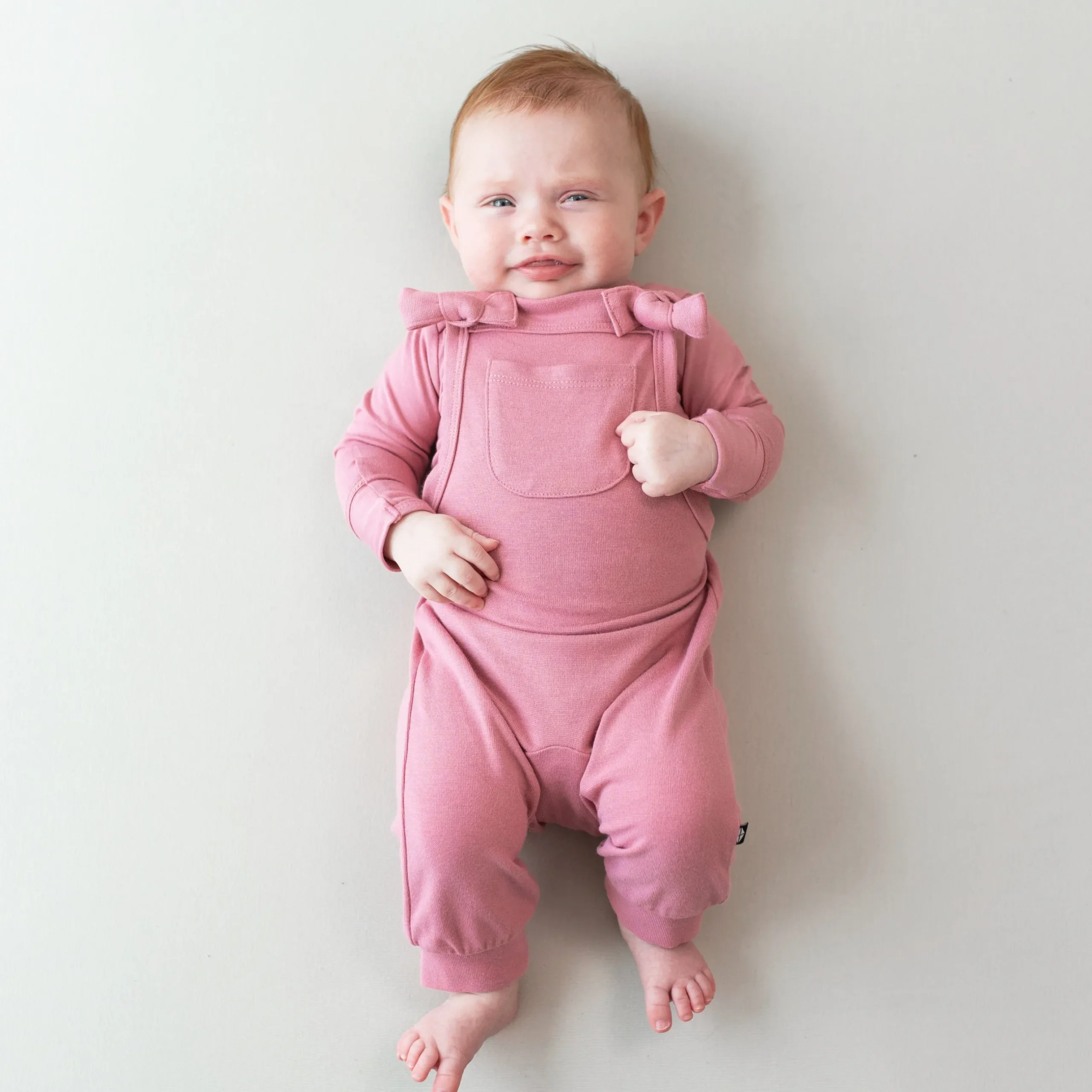 Sale Kyte Baby Bamboo Jersey Overall in Apple Blossom