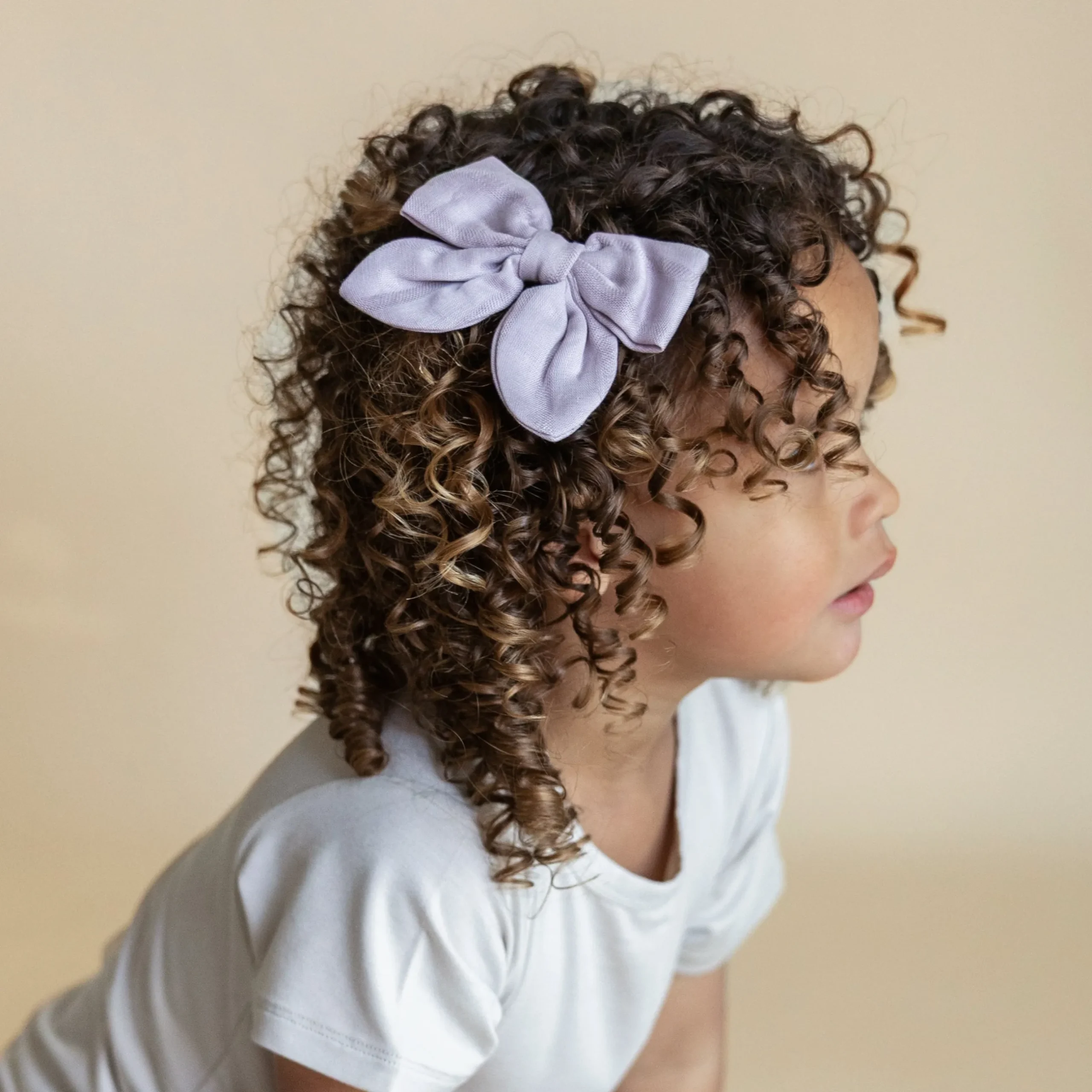 Sale Kyte Baby Bamboo Muslin Alligator Clip Bow in Wisteria