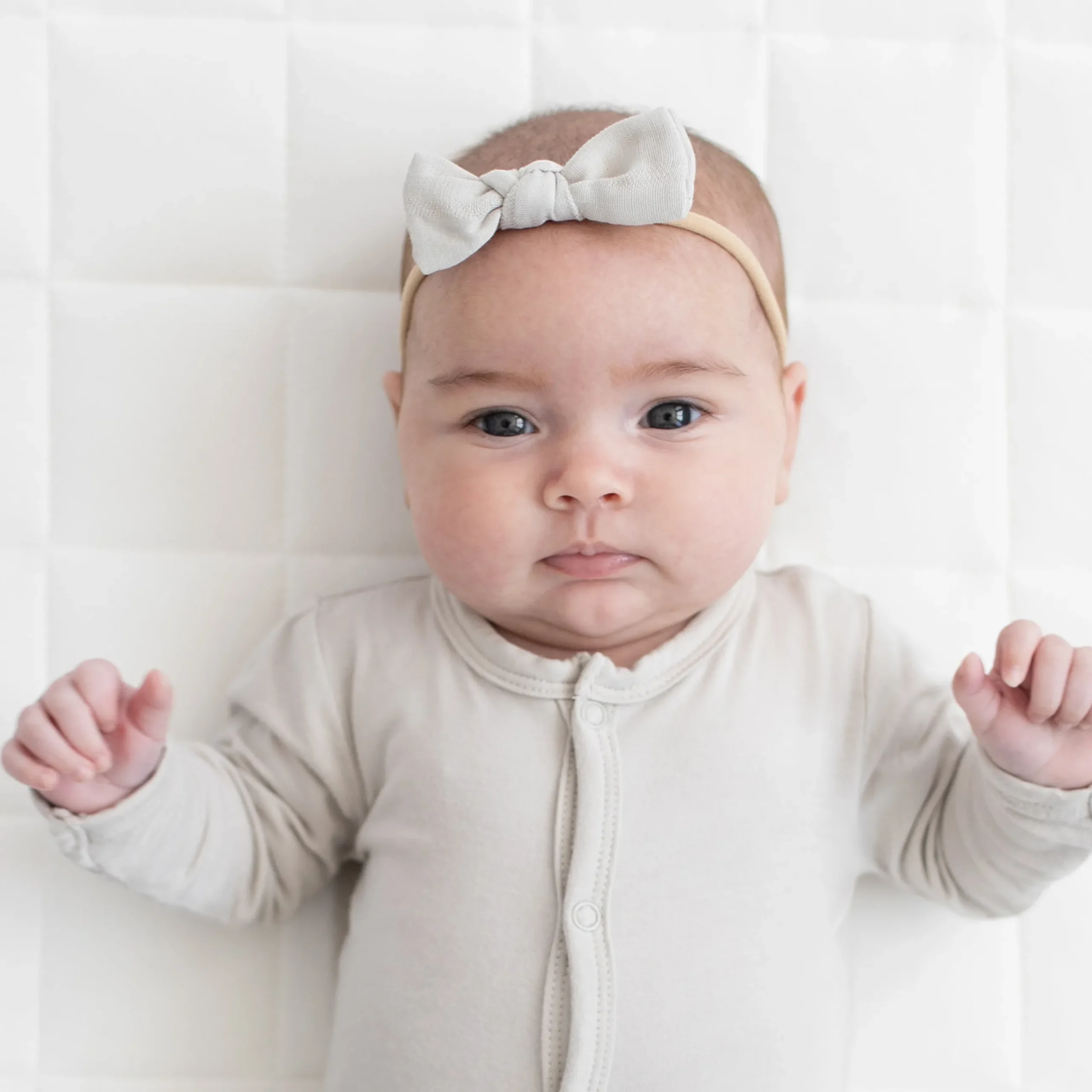 Sale Kyte Baby Bamboo Muslin Tiny Bow in Oat