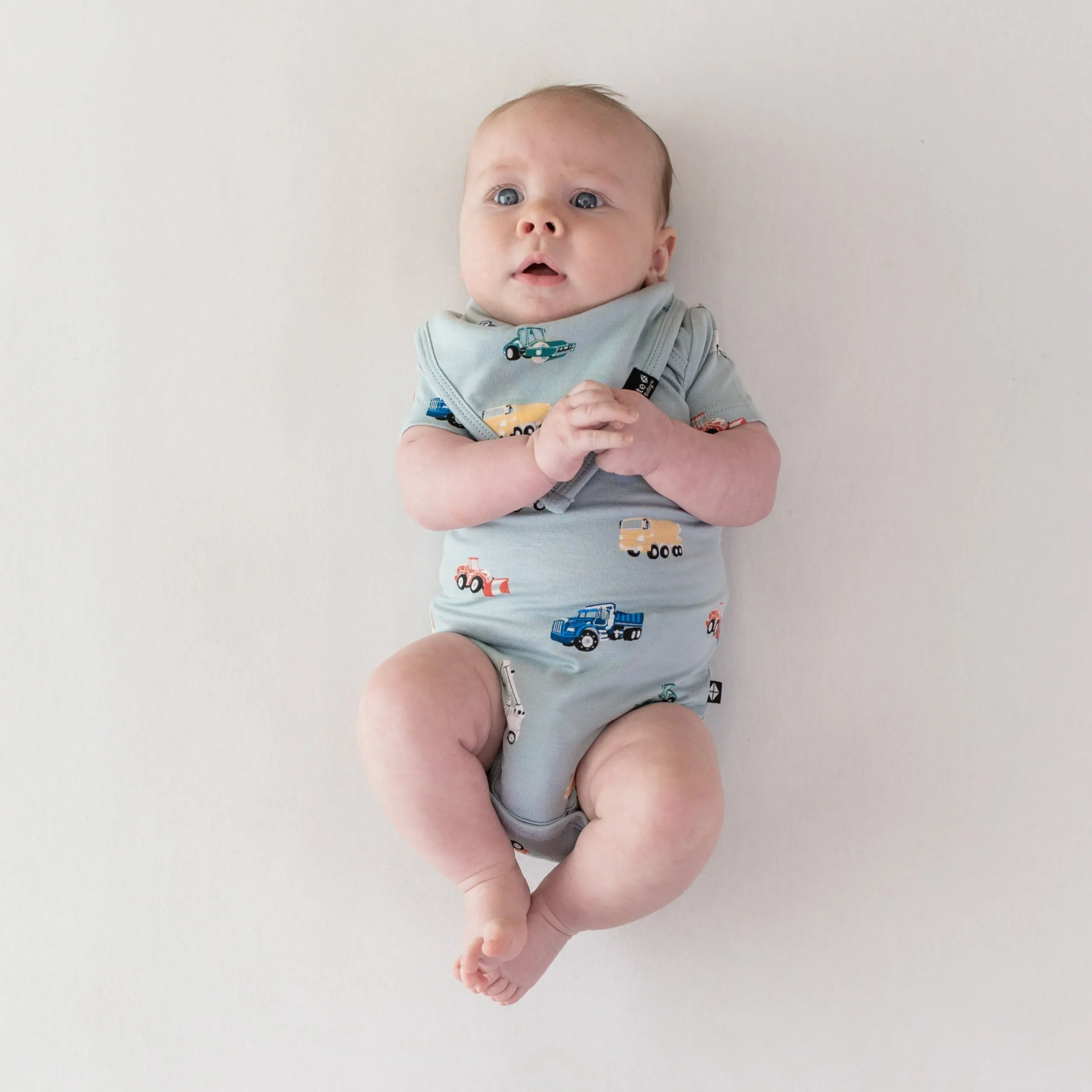 Sale Kyte Baby Bib in Construction