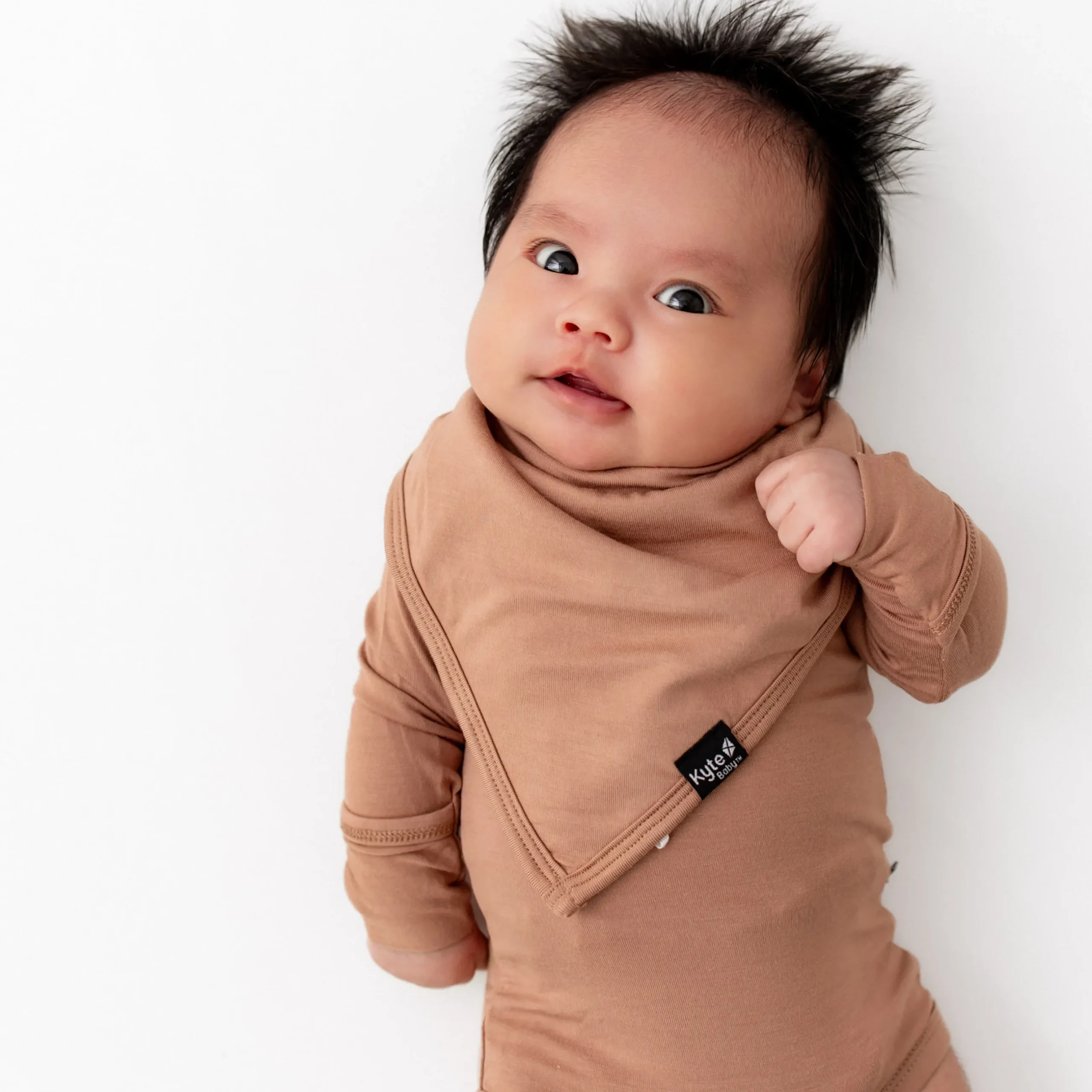 Online Kyte Baby Bib in Latte