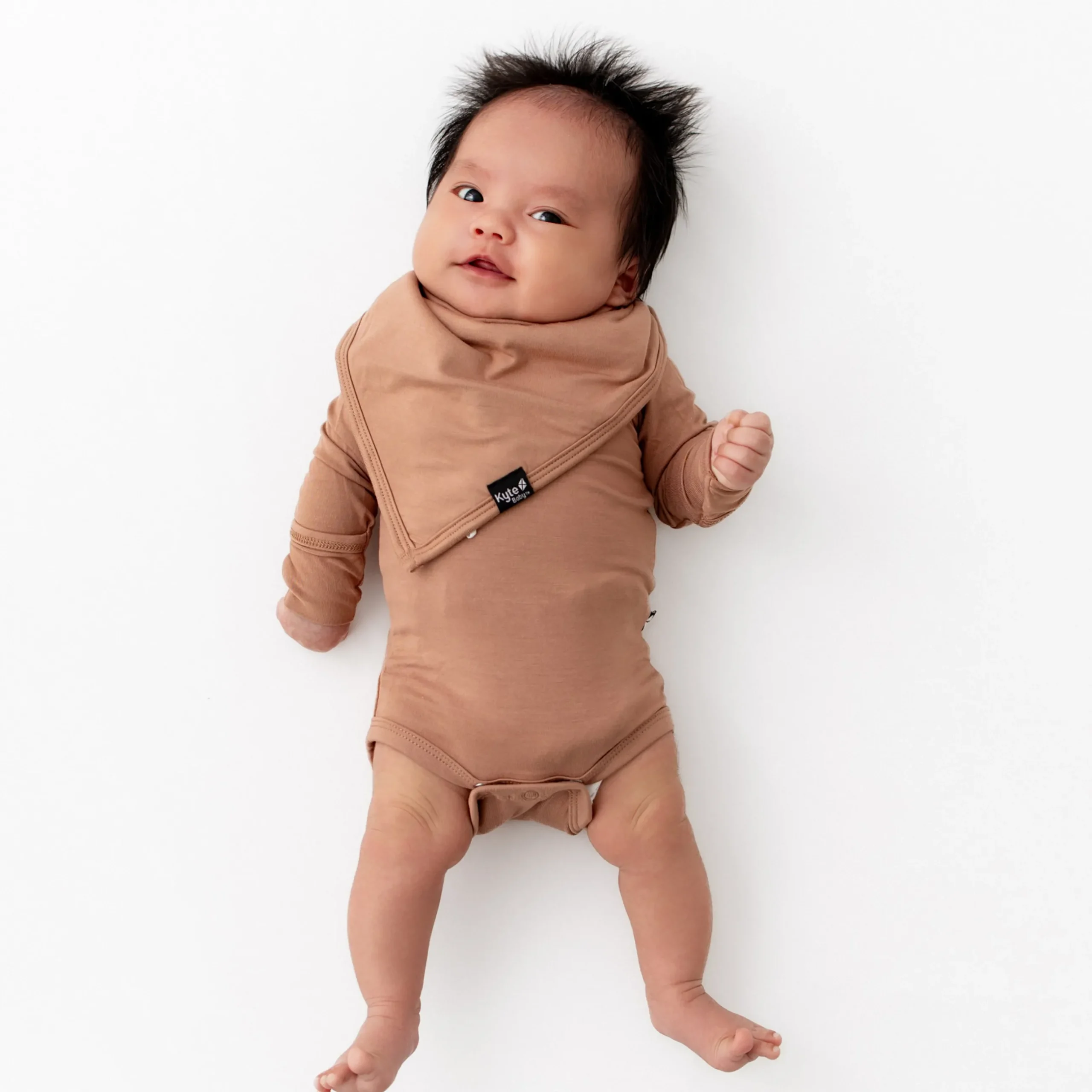 Online Kyte Baby Bib in Latte