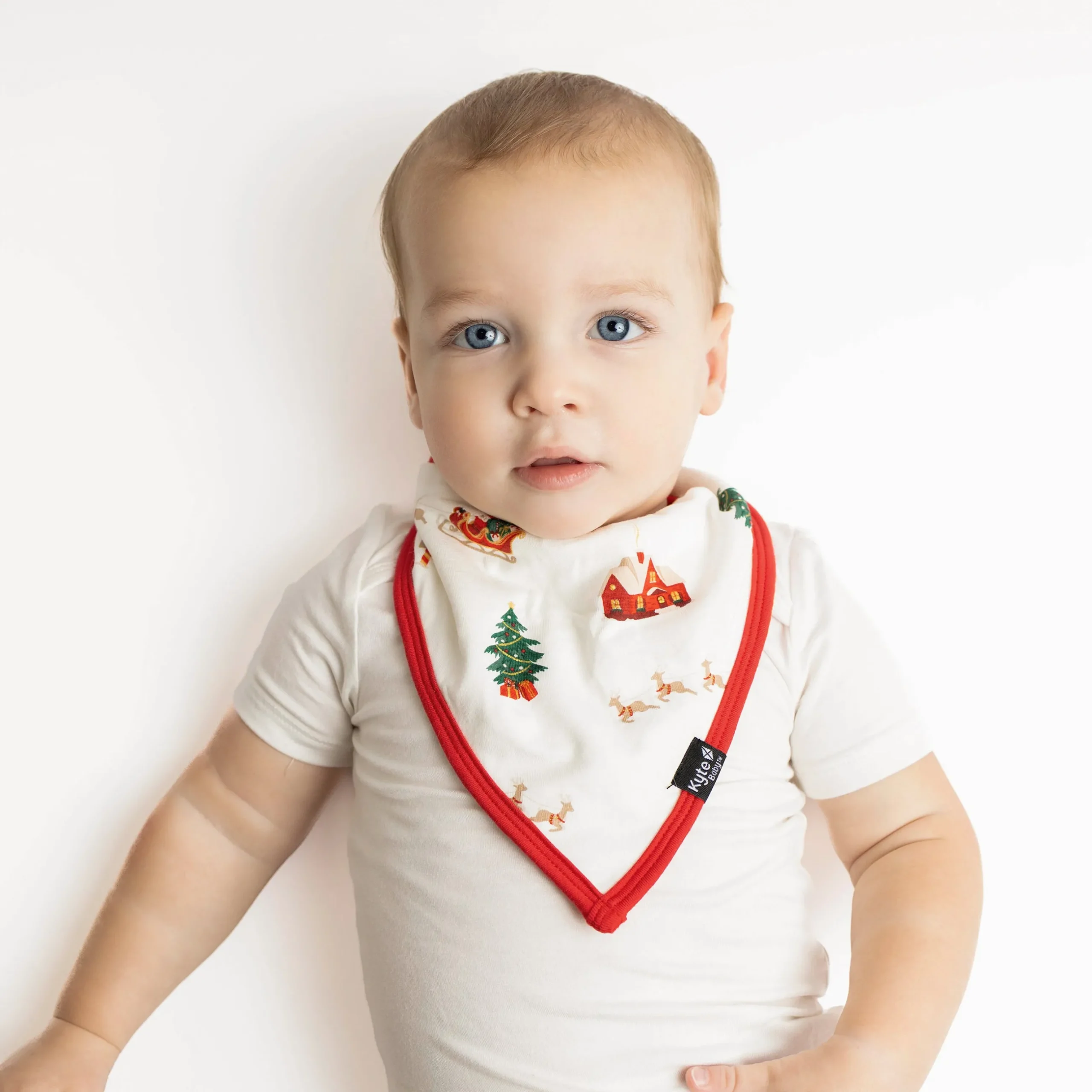 Discount Kyte Baby Bib in Santa Sleigh