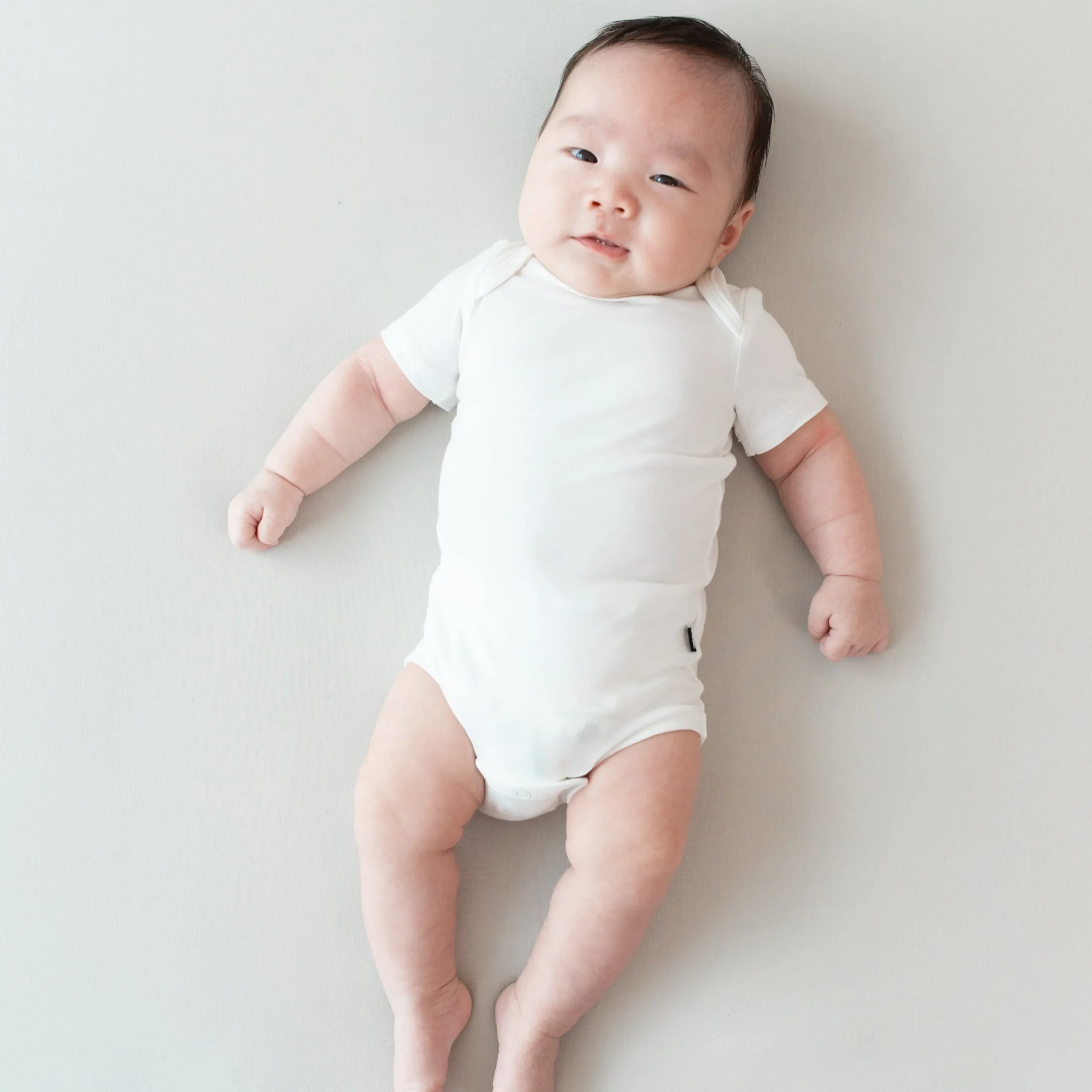 Discount Kyte Baby Bodysuit in Cloud