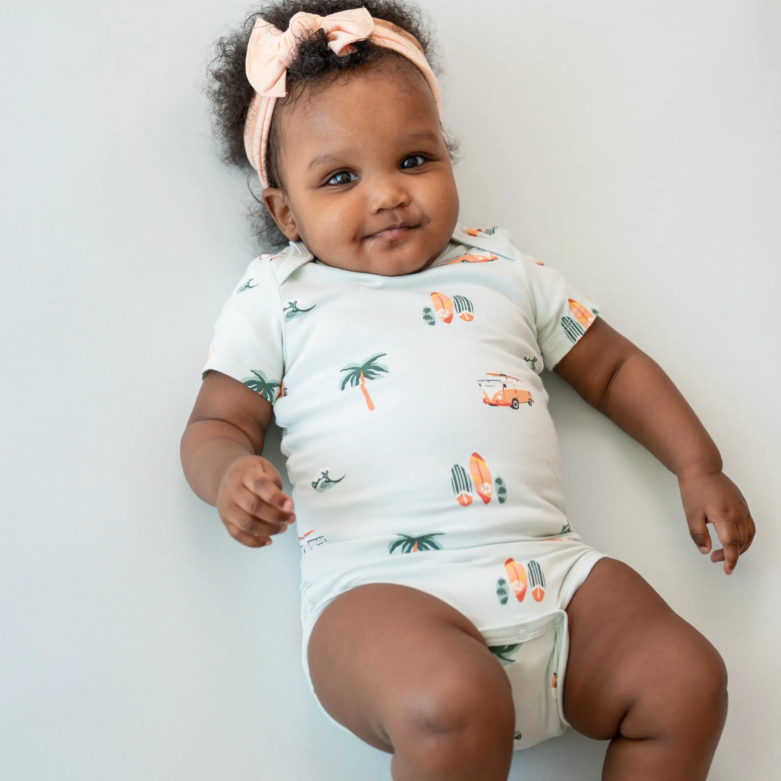 Kyte Baby Bodysuit in Dew Surf