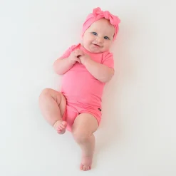 Kyte Baby Bodysuit in Guava