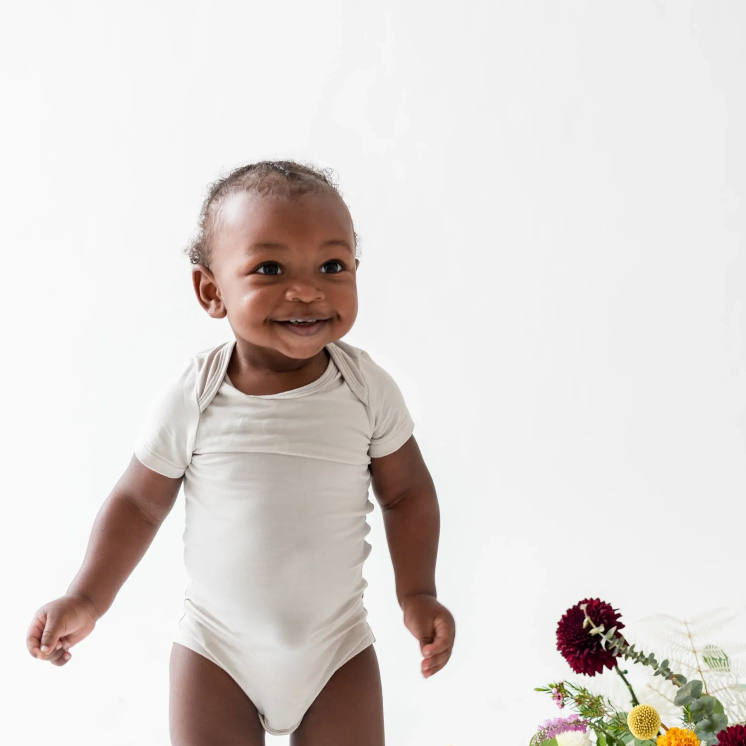 Online Kyte Baby Bodysuit in Oat
