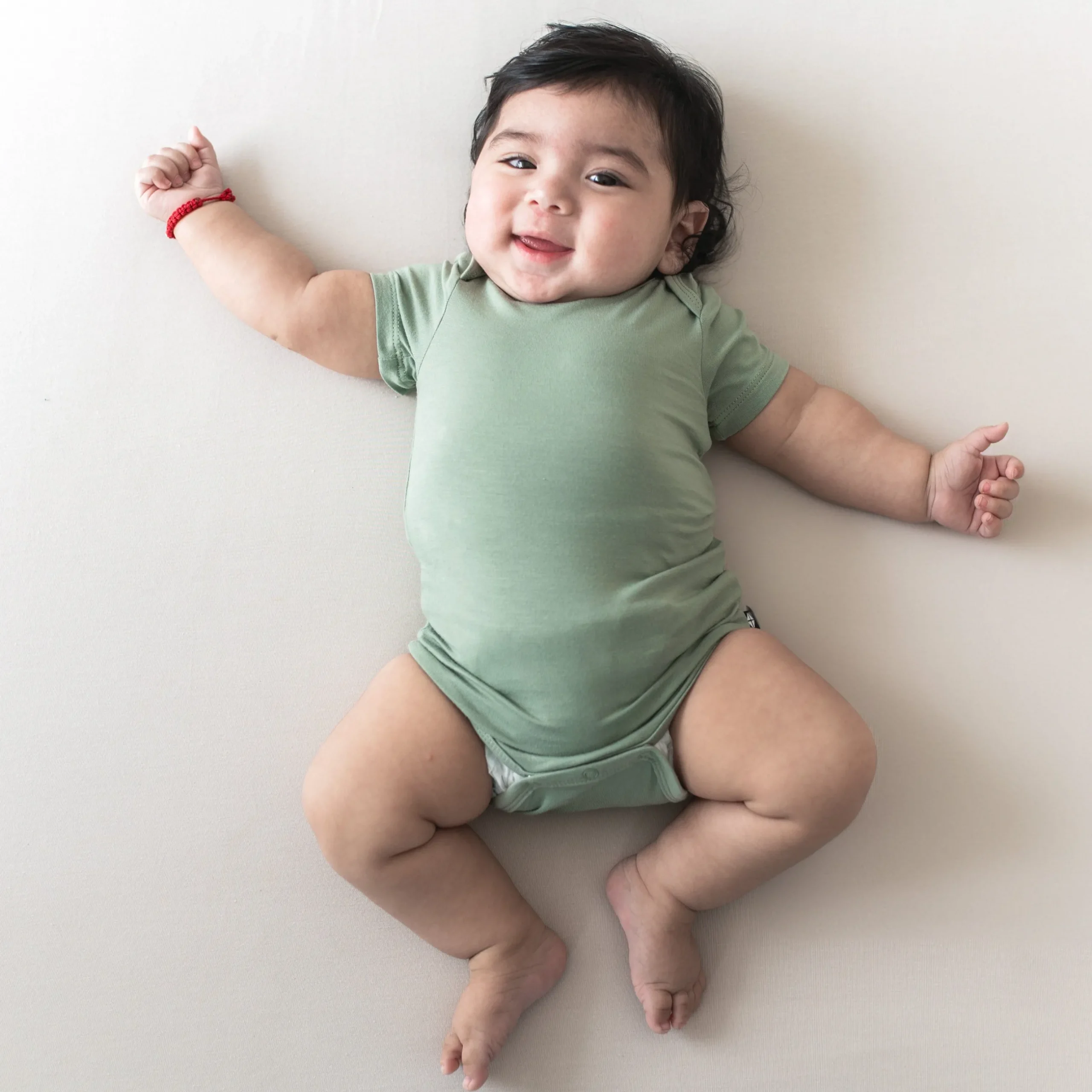 Hot Kyte Baby Bodysuit in Thyme