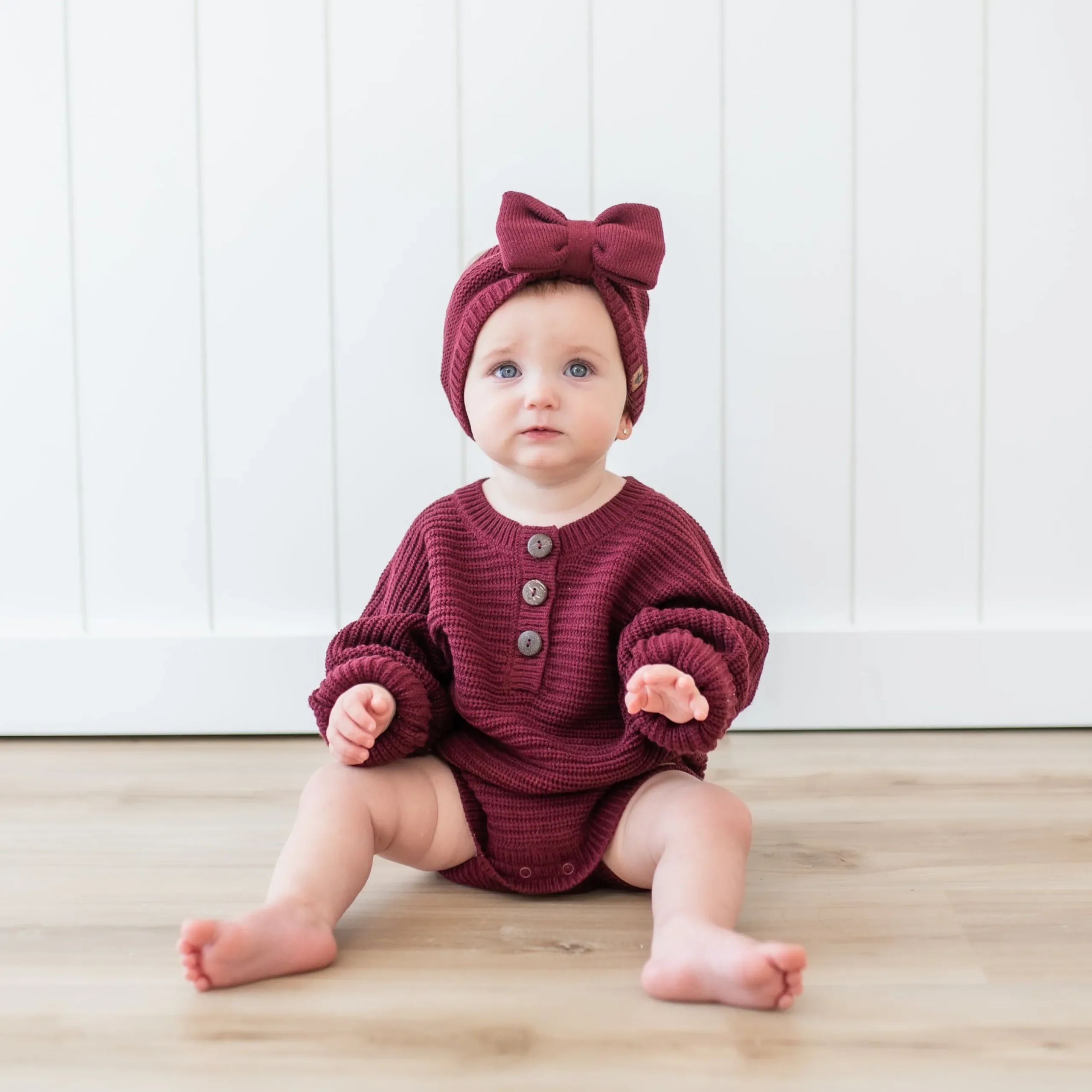 New Kyte Baby Chunky Knit Romper in Burgundy