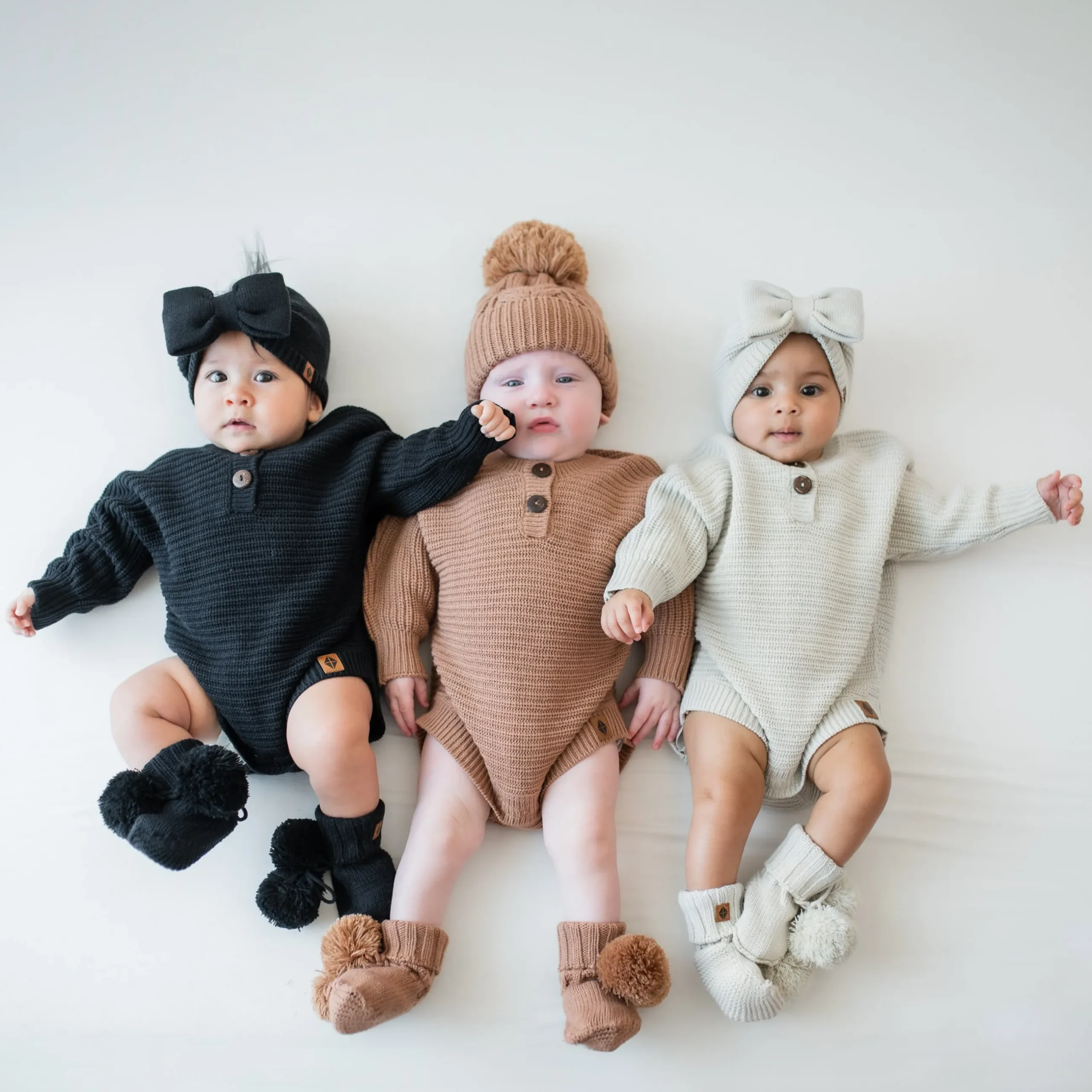 New Kyte Baby Chunky Knit Romper in Oat