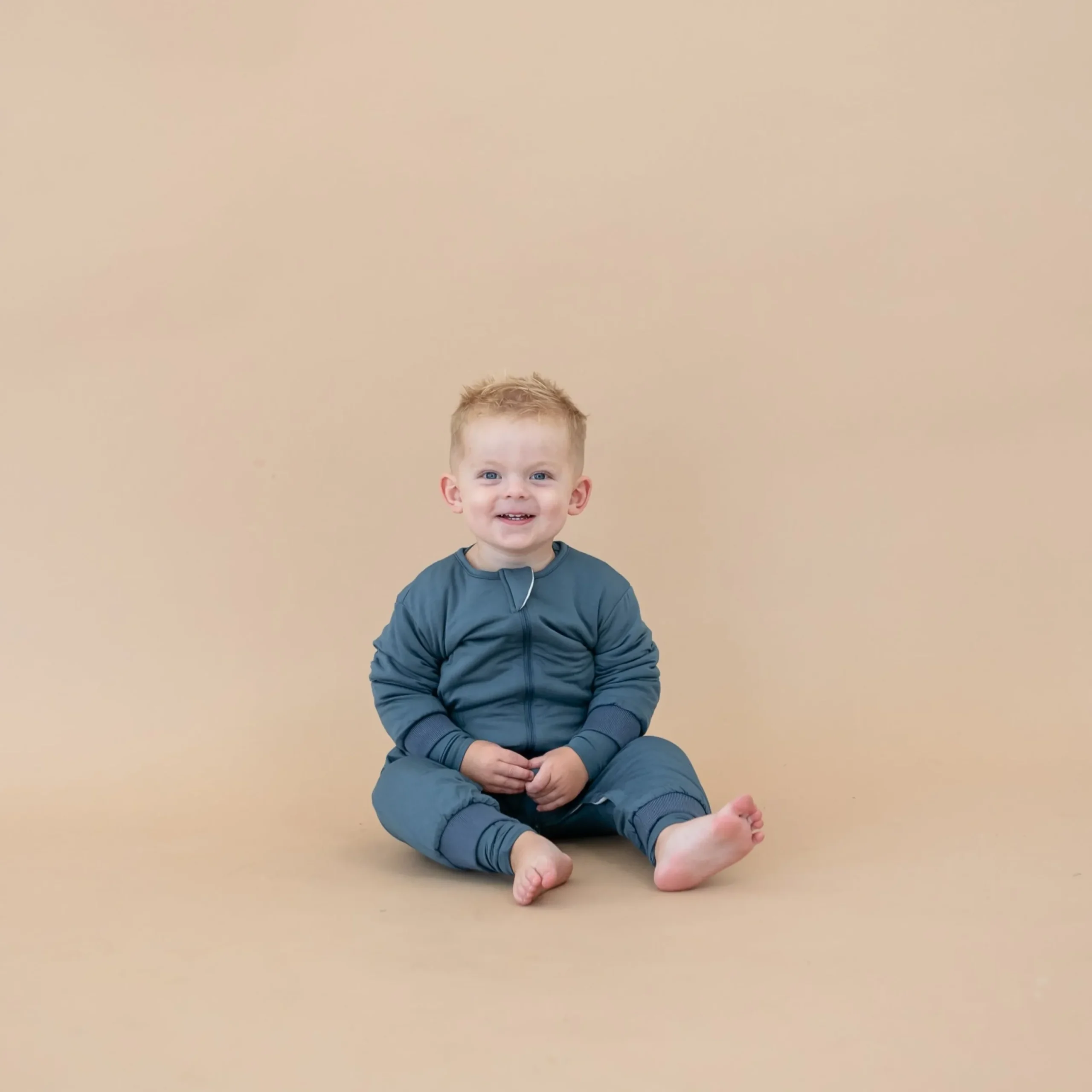 Sale Kyte Baby Cozy Playsuit in Atlantic