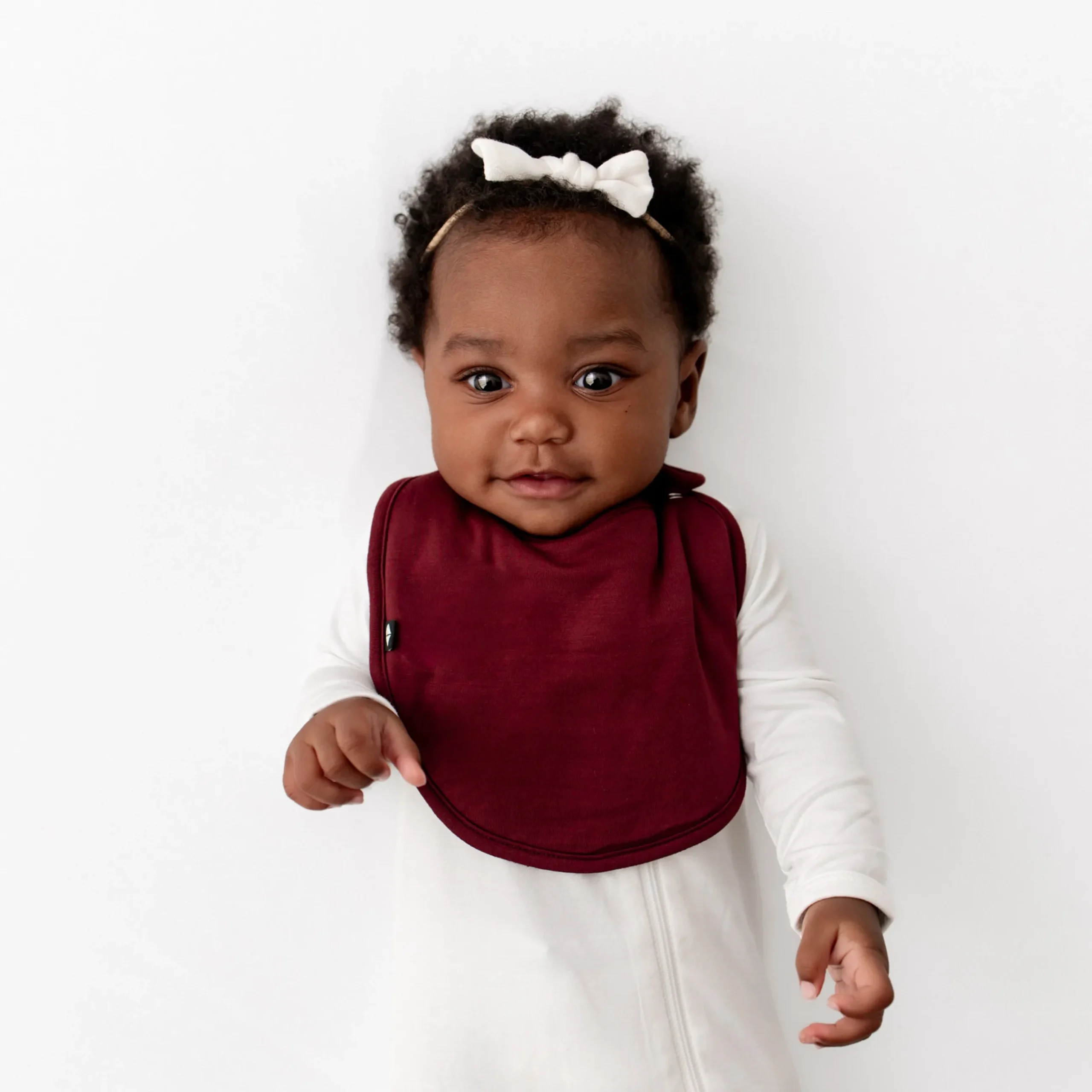Kyte Baby Cushy Bib in Burgundy