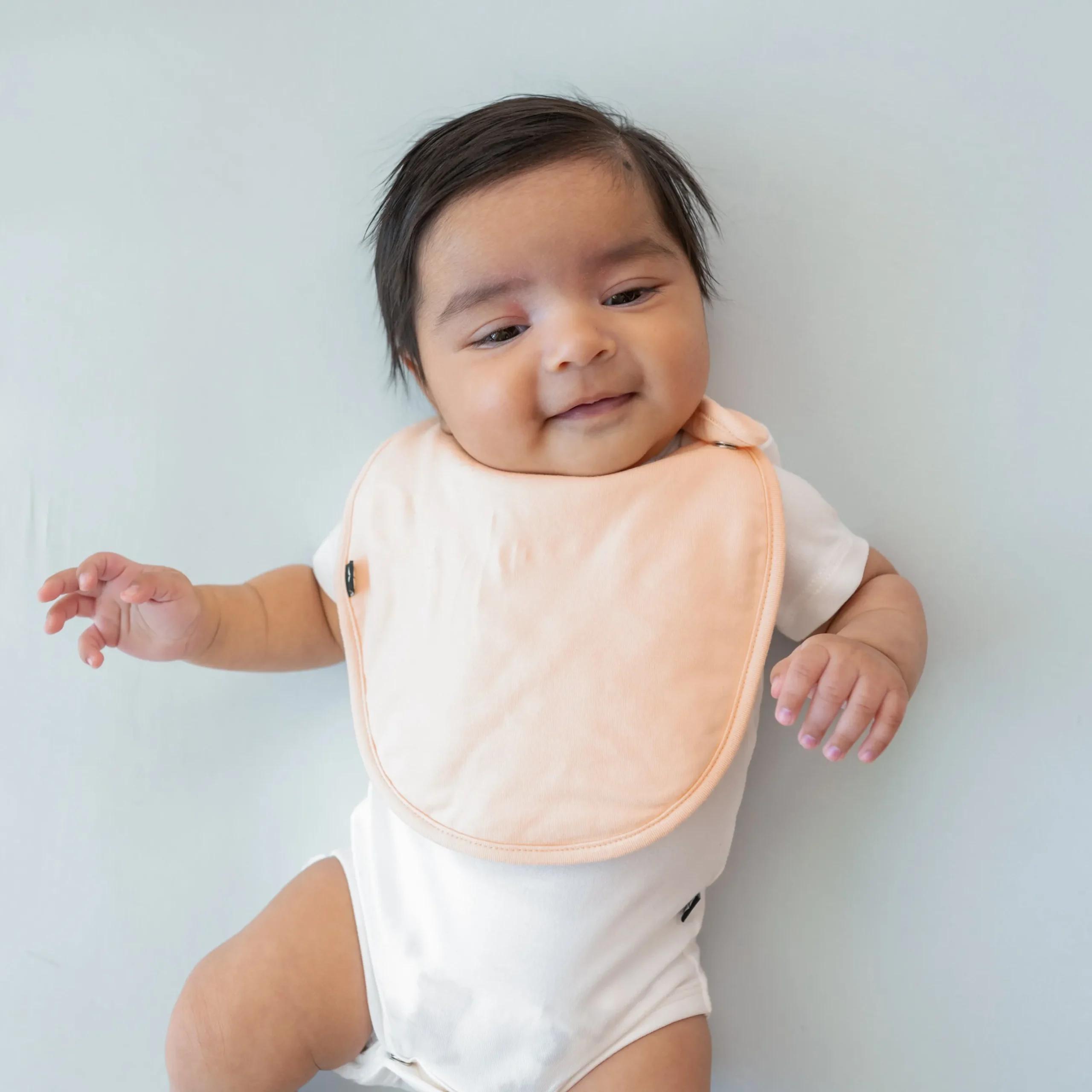 Discount Kyte Baby Cushy Bib in Canyon