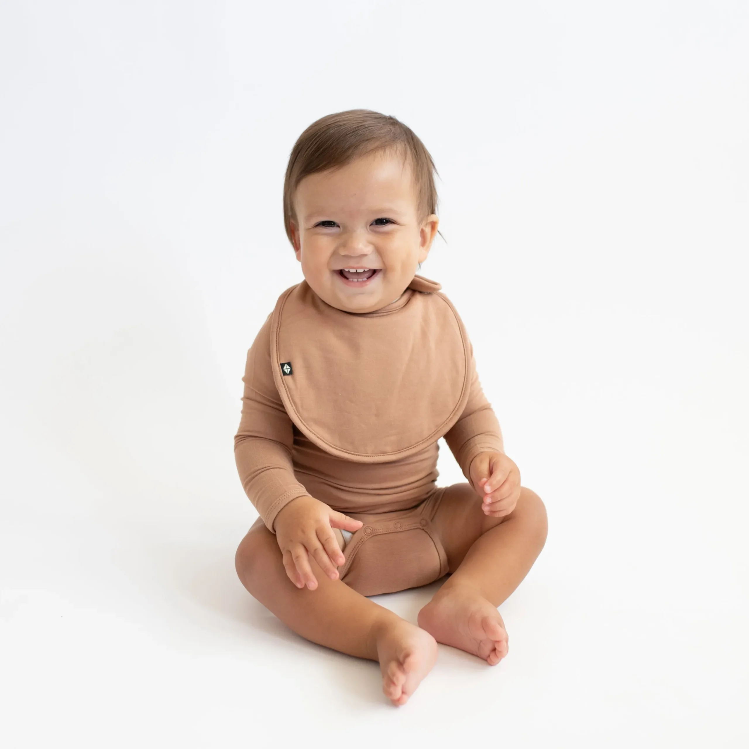 Clearance Kyte Baby Cushy Bib in Latte
