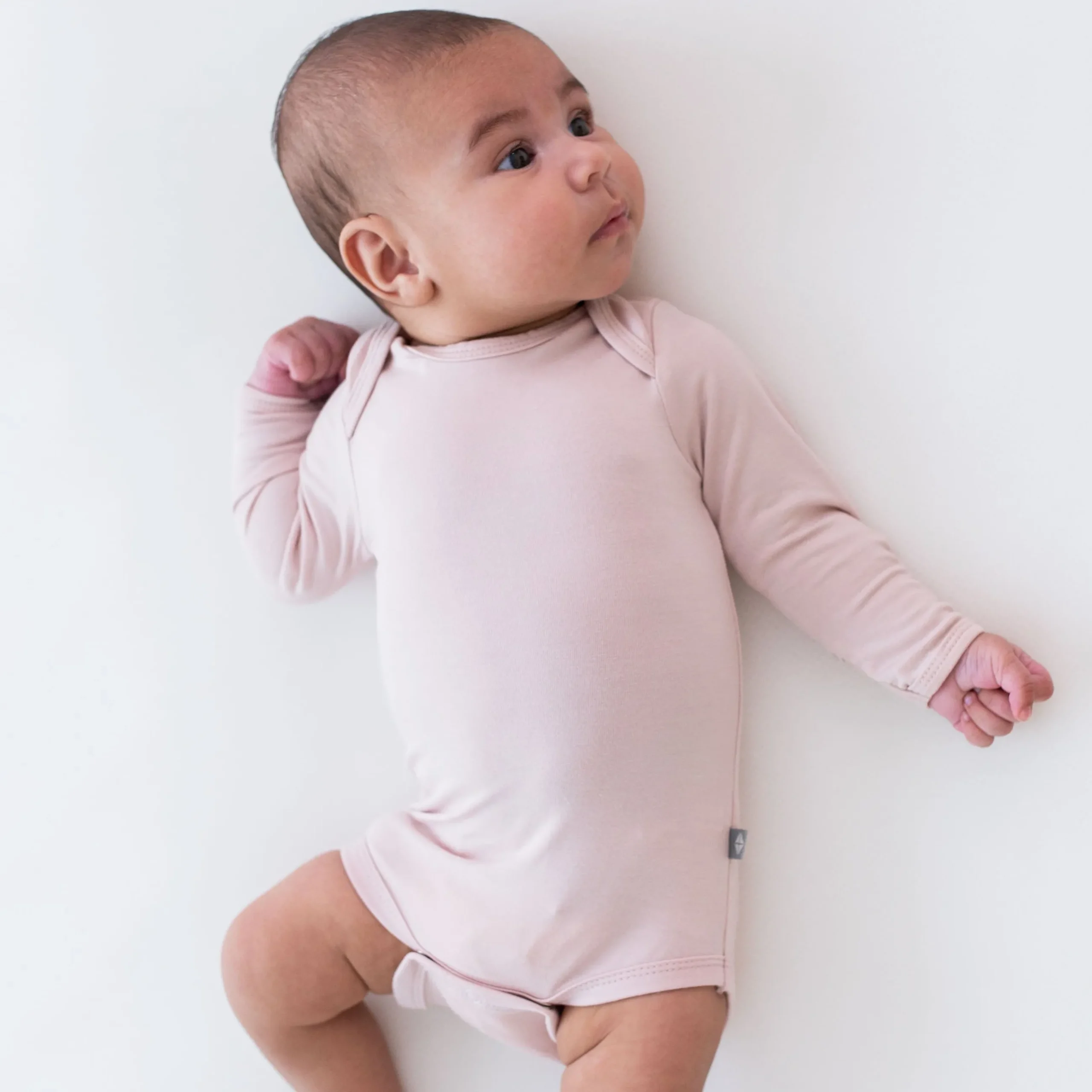 Kyte Baby Long Sleeve Bodysuit in Blush