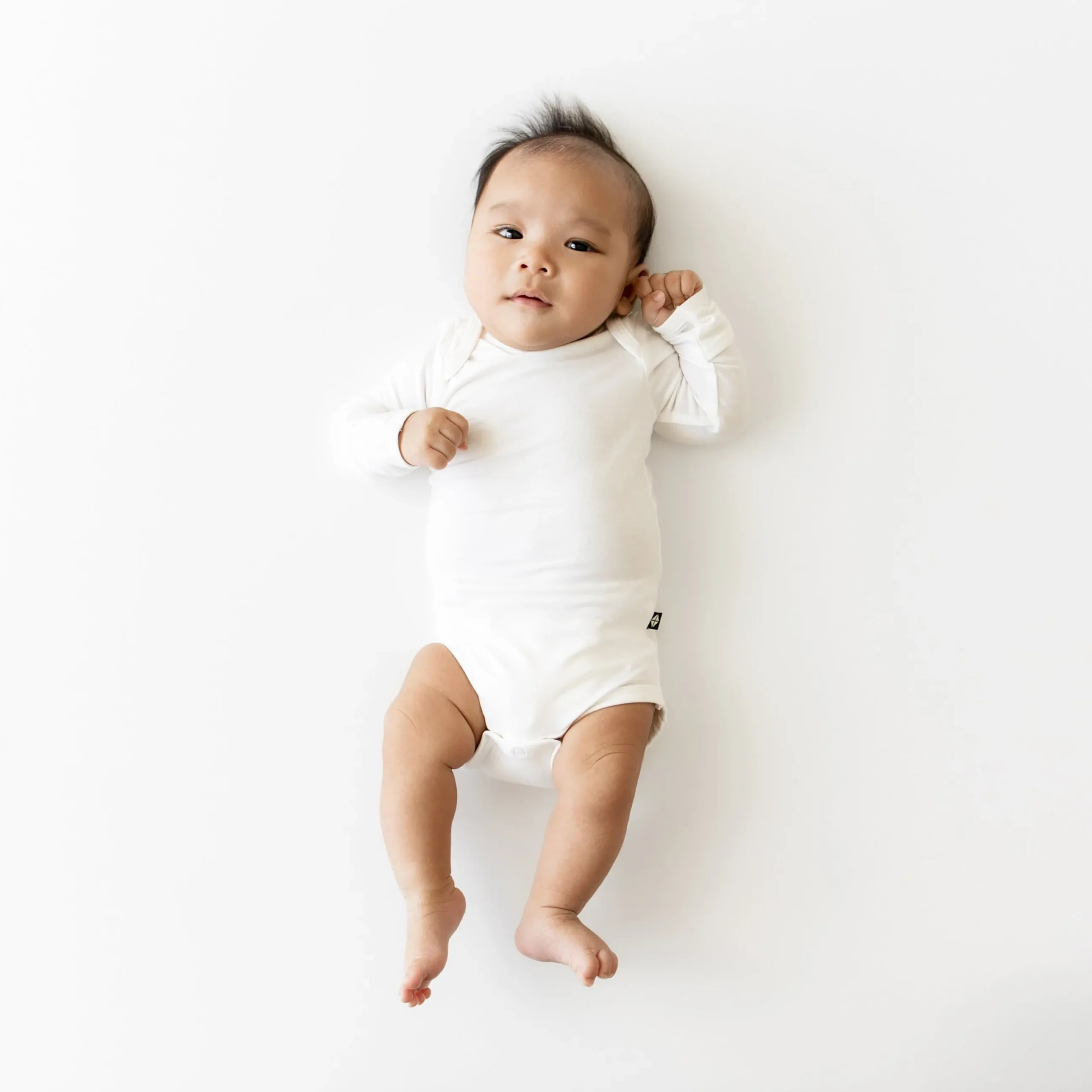 Kyte Baby Long Sleeve Bodysuit in Cloud