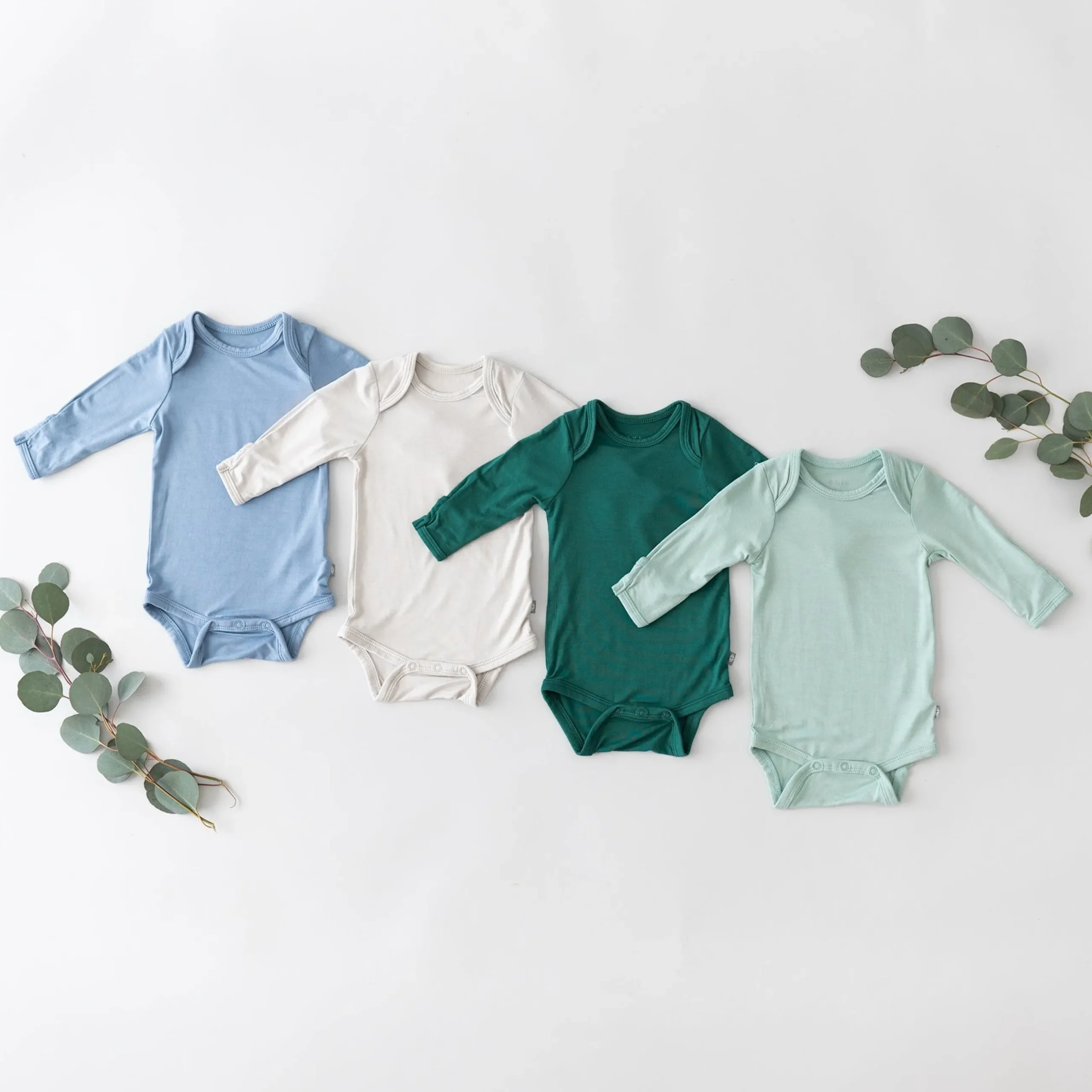 Outlet Kyte Baby Long Sleeve Bodysuit in Emerald