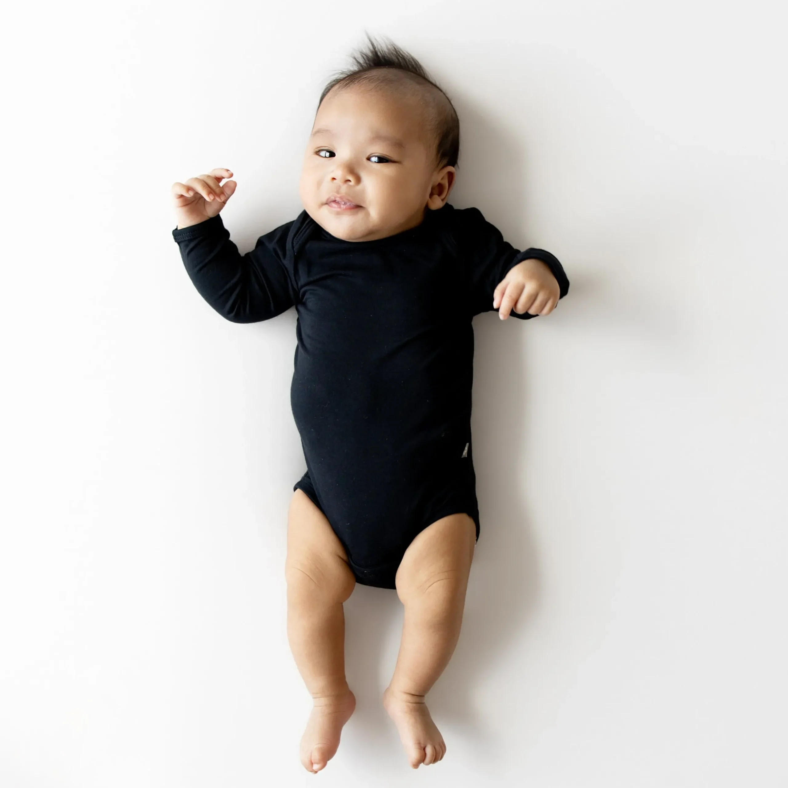 Online Kyte Baby Long Sleeve Bodysuit in Midnight