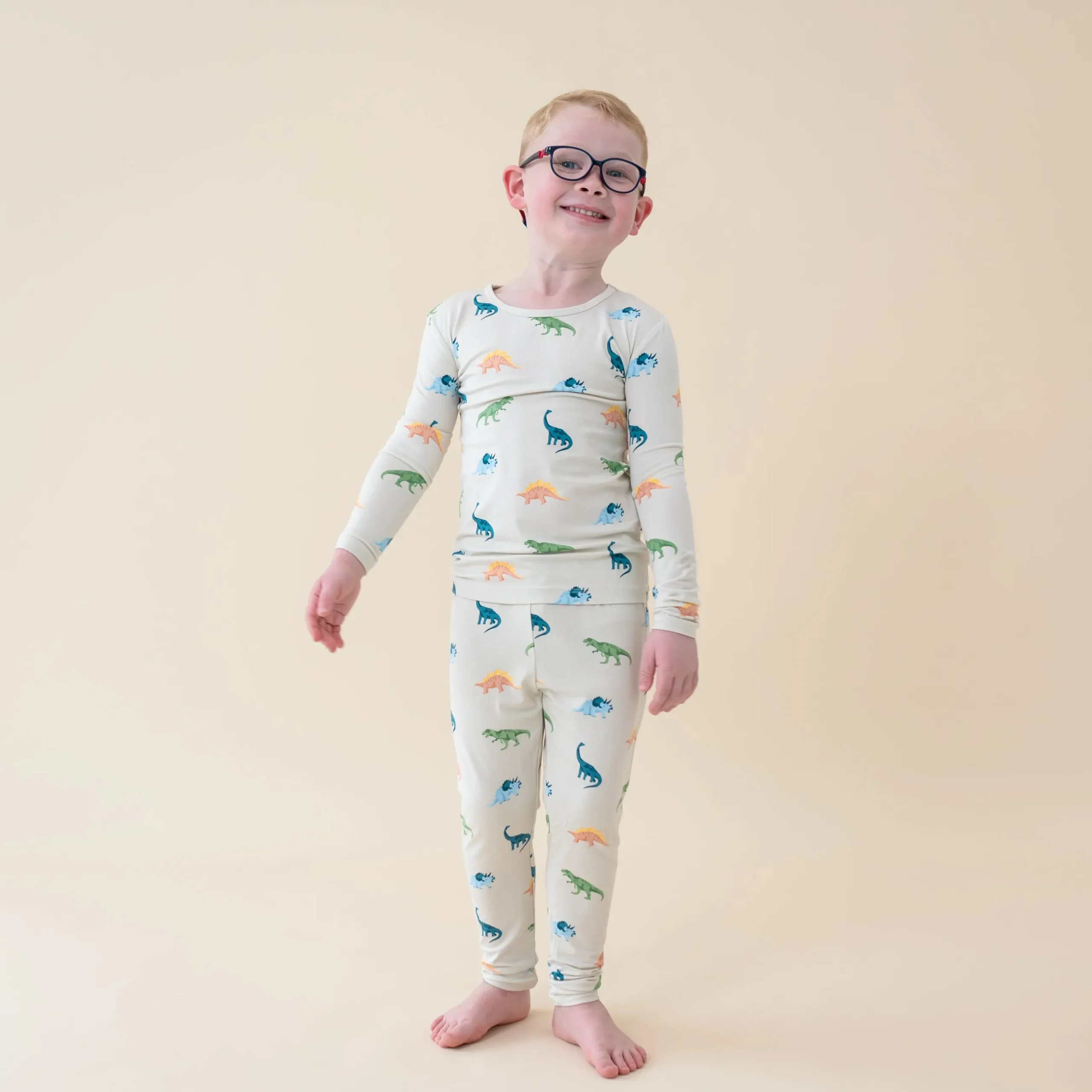 New Kyte Baby Long Sleeve Pajamas in Ecru Roar