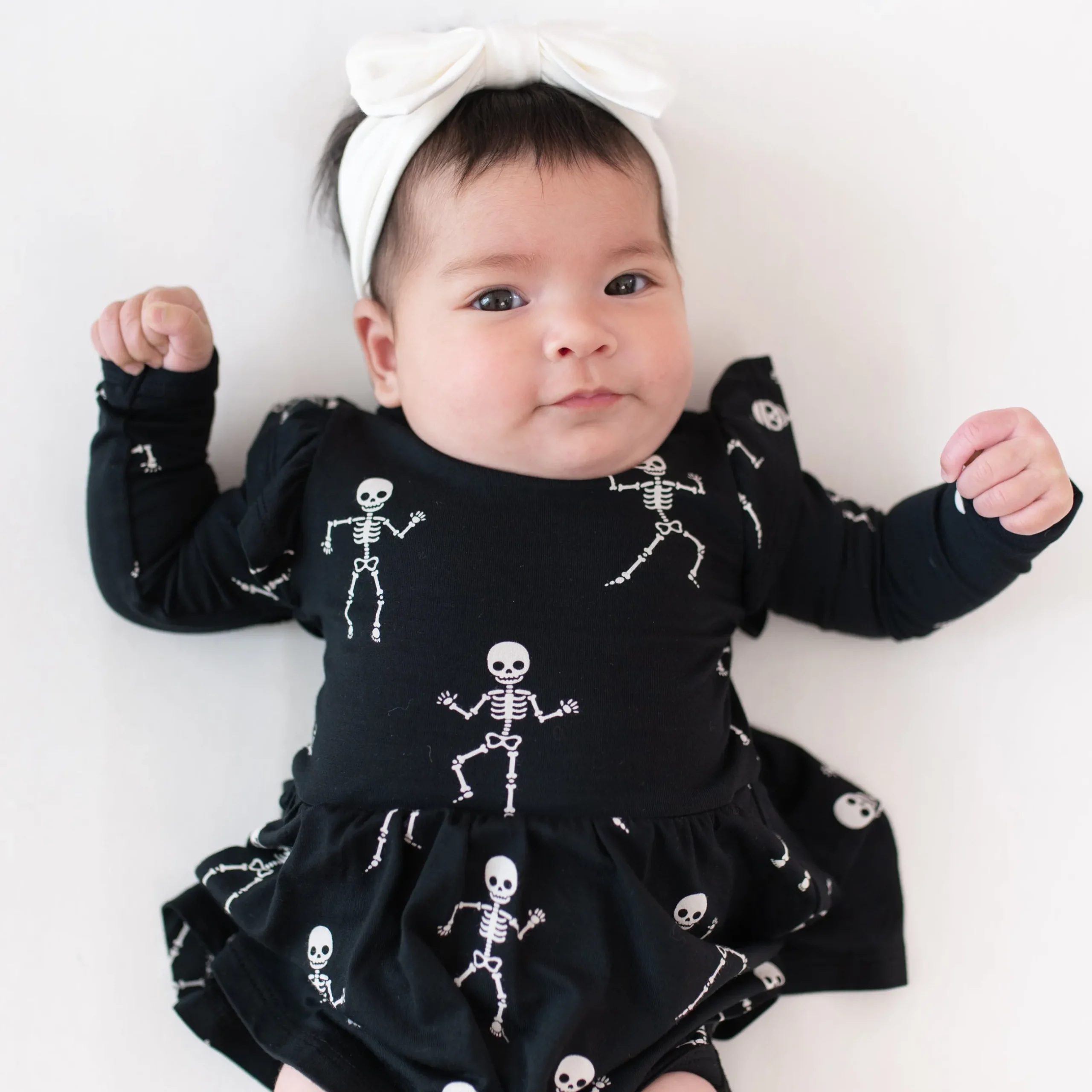 New Kyte Baby Long Sleeve Twirl Bodysuit Dress in Skeleton