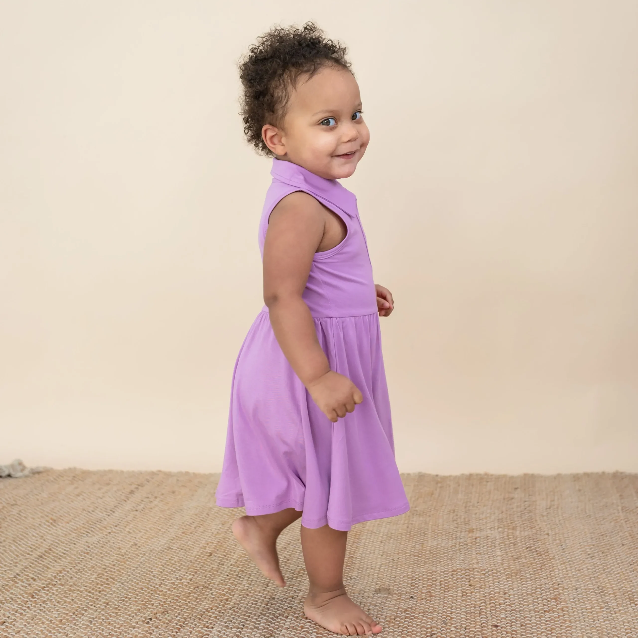 Kyte Baby Polo Bodysuit Dress in Poi