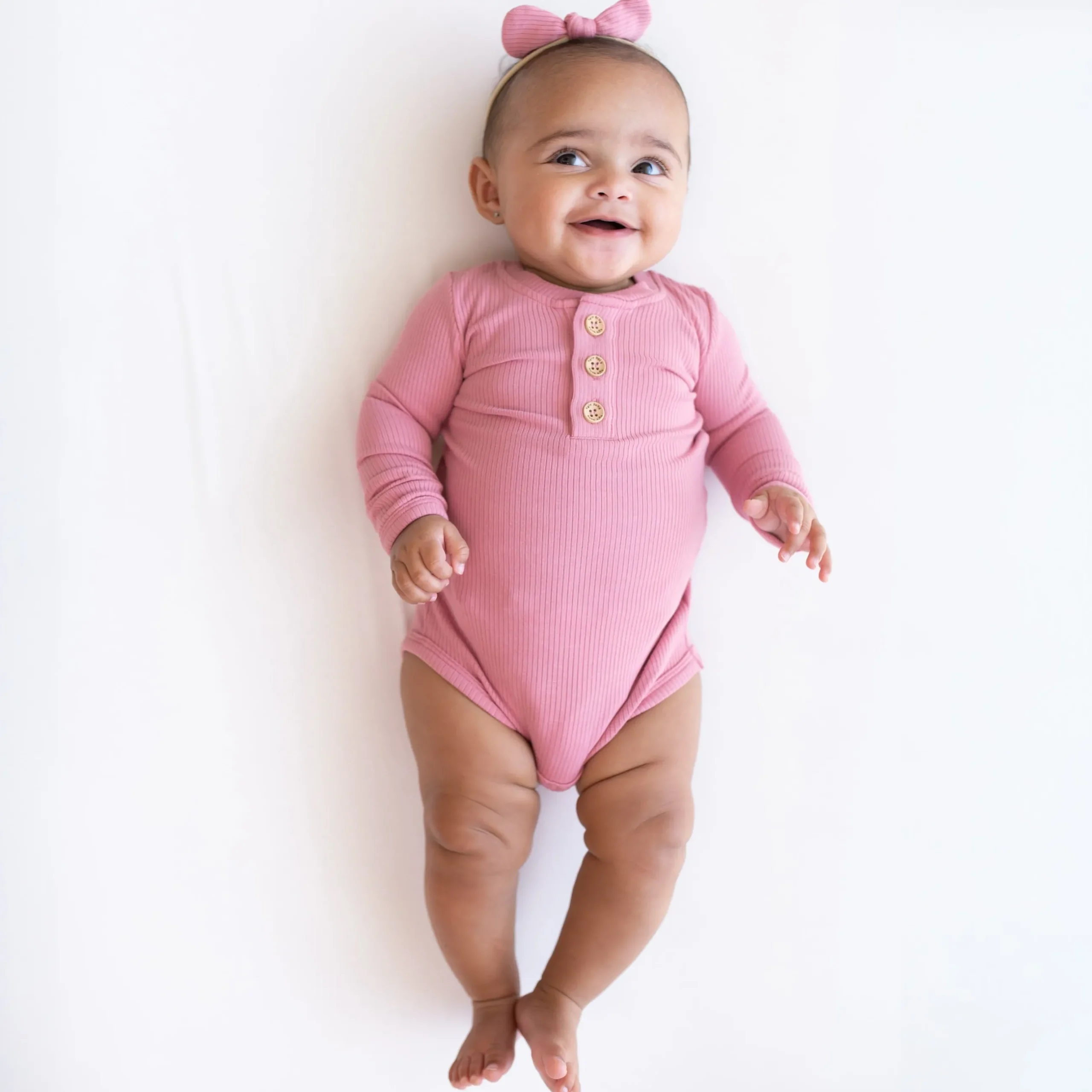 Best Kyte Baby Ribbed Long Sleeve Henley Bodysuit in Apple Blossom