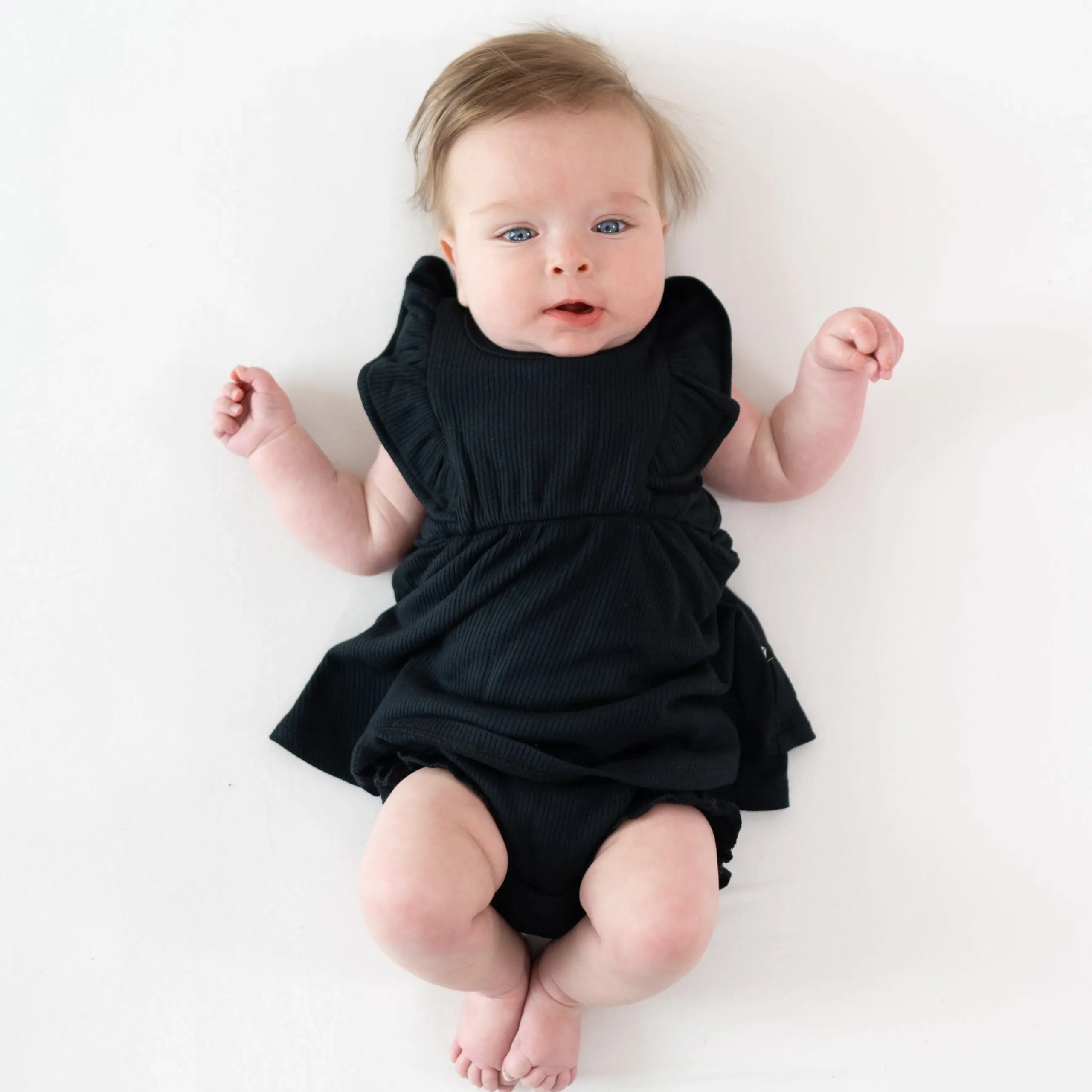 New Kyte Baby Ribbed Peplum Dress Set in Midnight