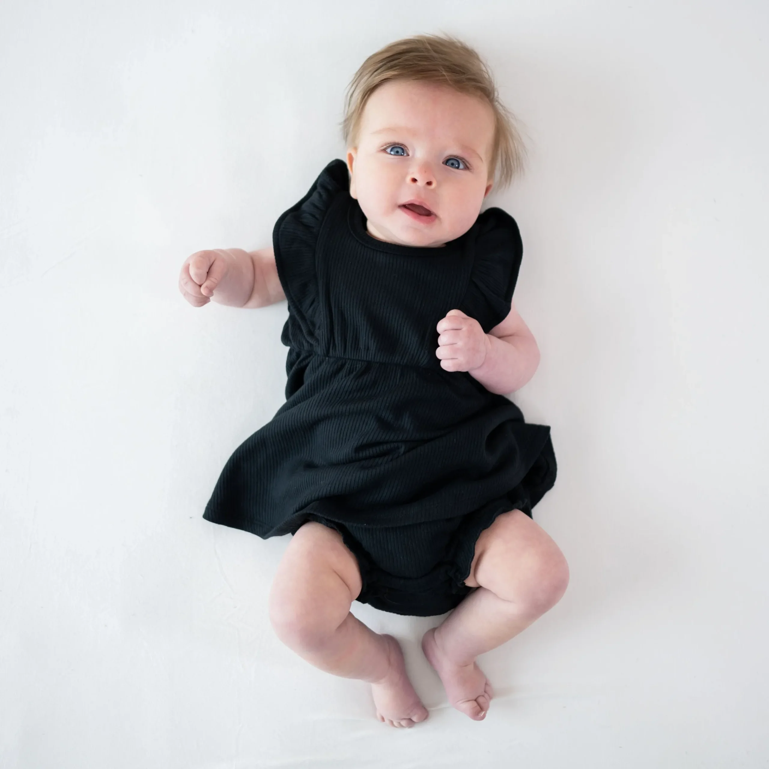 New Kyte Baby Ribbed Peplum Dress Set in Midnight
