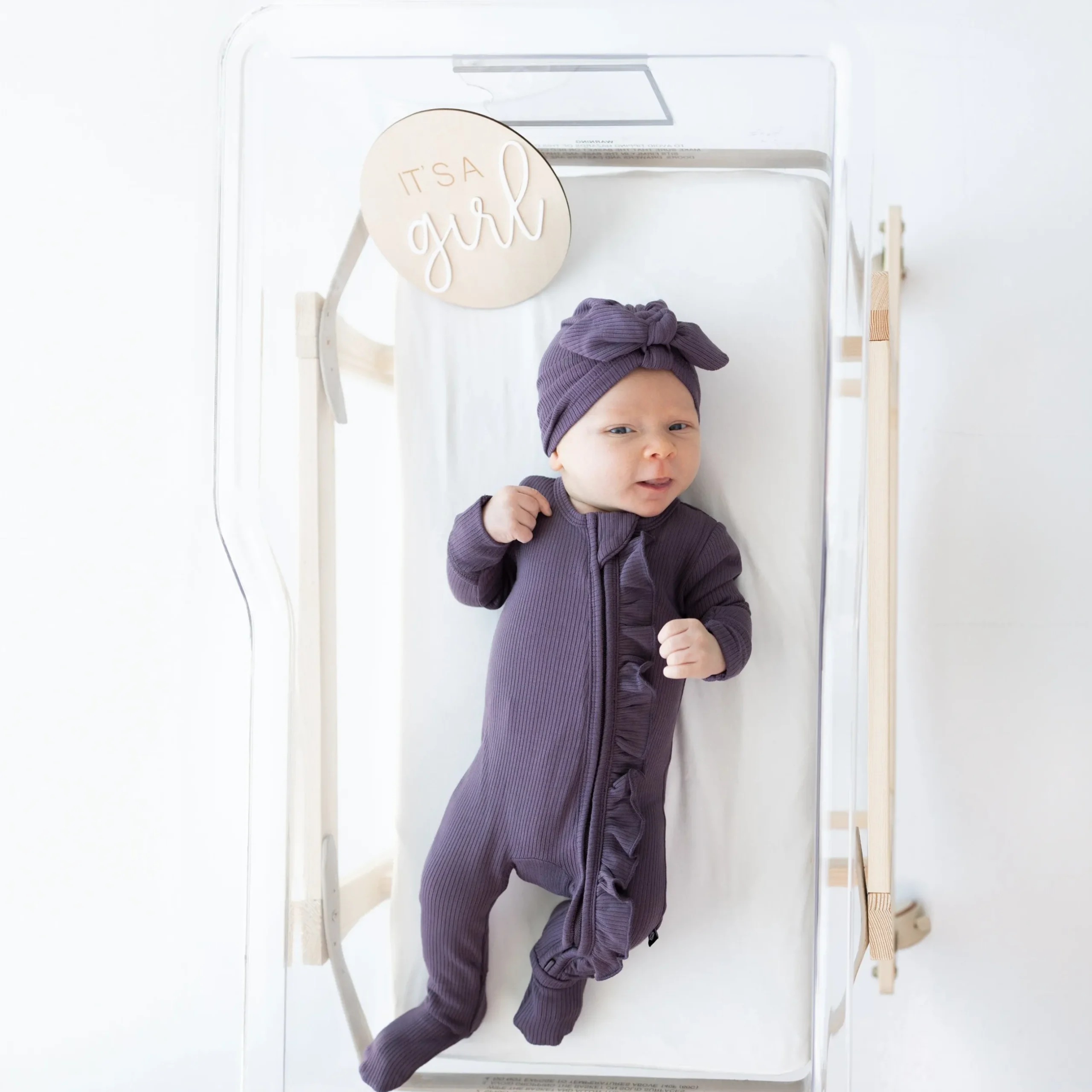 Kyte Baby Ribbed Ruffle Zipper Footie in Currant