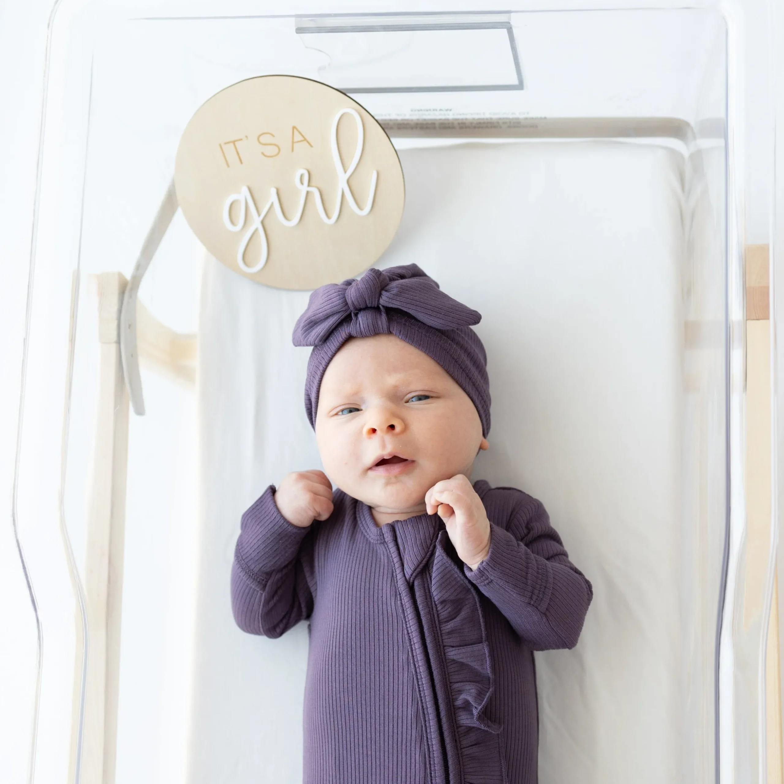 Kyte Baby Ribbed Ruffle Zipper Footie in Currant