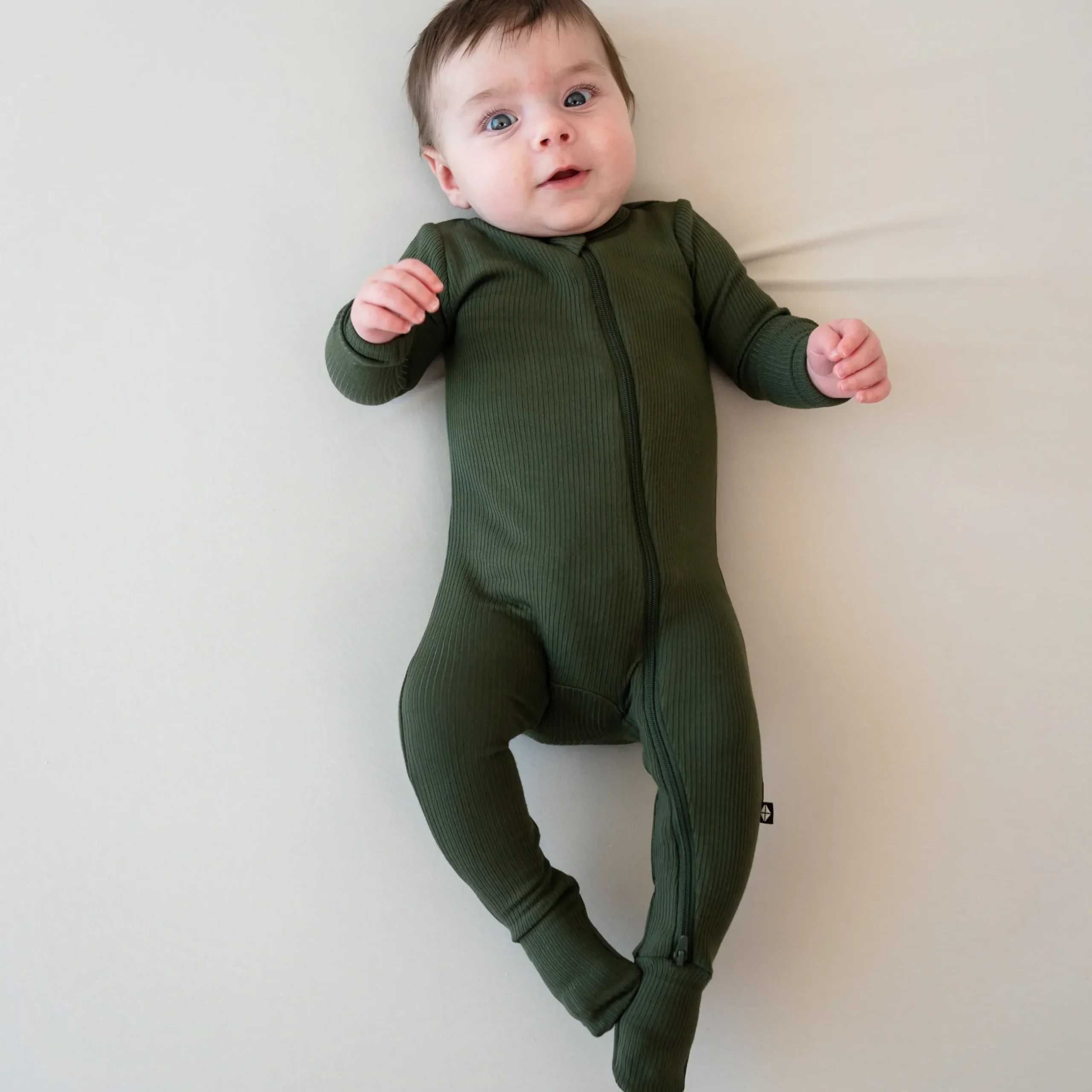 New Kyte Baby Ribbed Zipper Footie in Fir