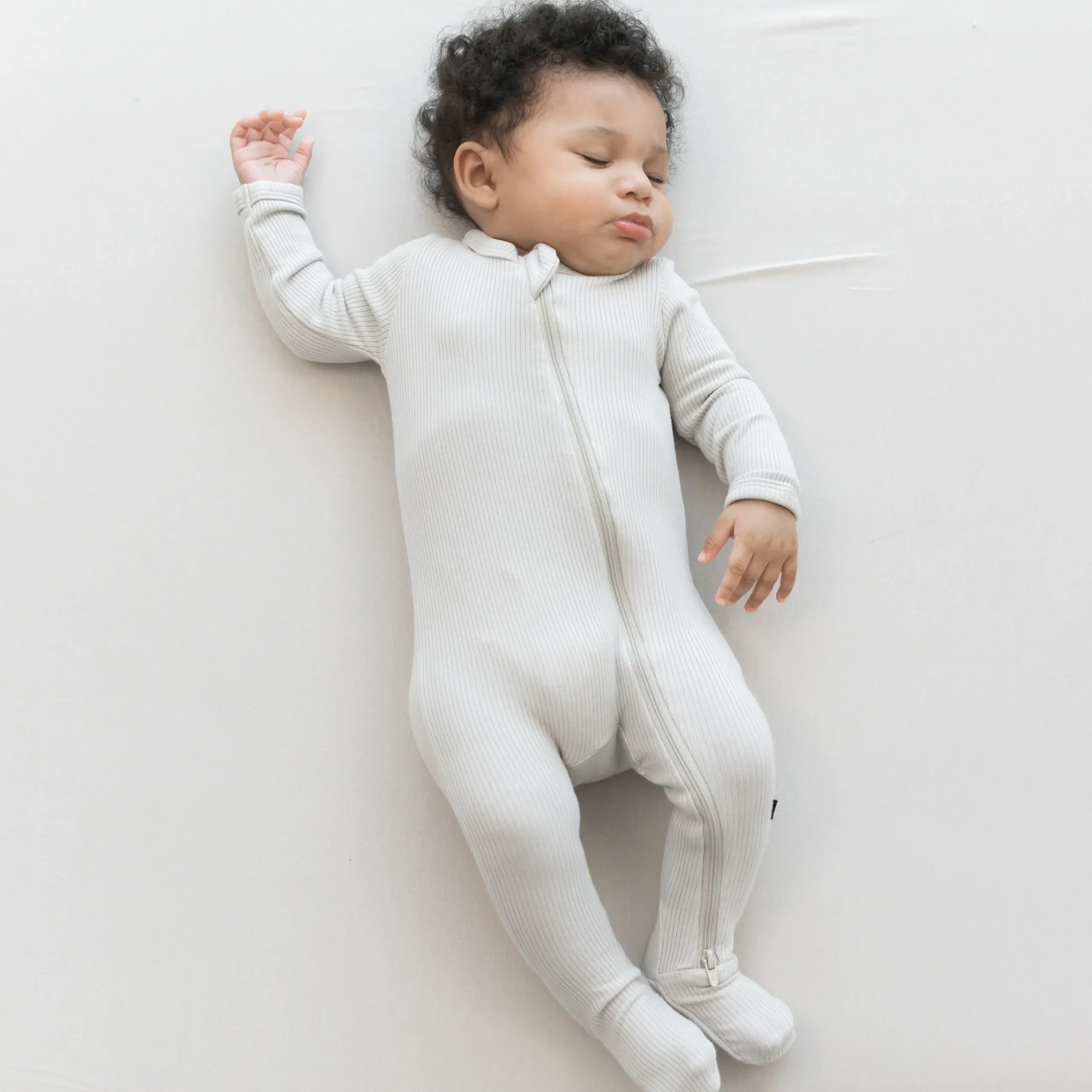 Clearance Kyte Baby Ribbed Zipper Footie in Oat