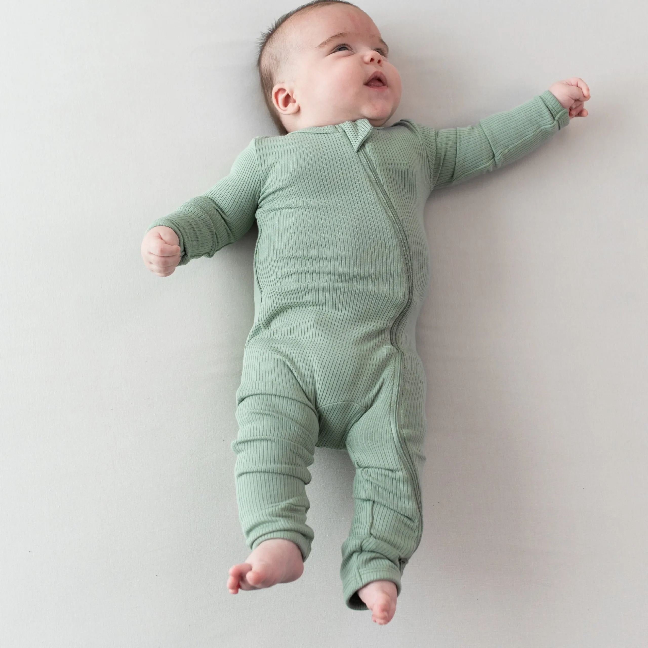 Clearance Kyte Baby Ribbed Zipper Romper in Thyme