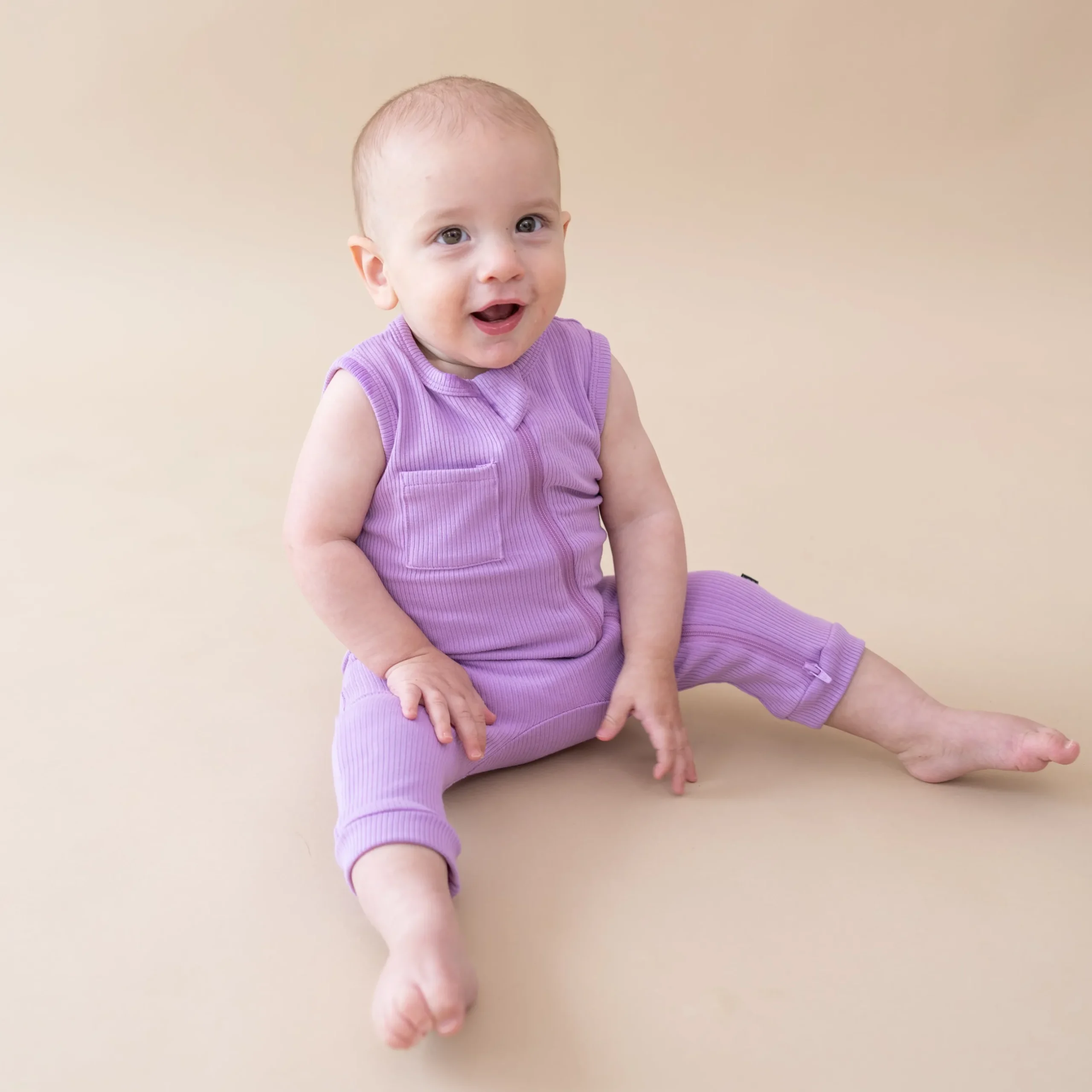 Hot Kyte Baby Ribbed Zippered Sleeveless Romper in Poi