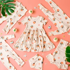 Clearance Kyte Baby Short Sleeve Tiered Dress in Peach