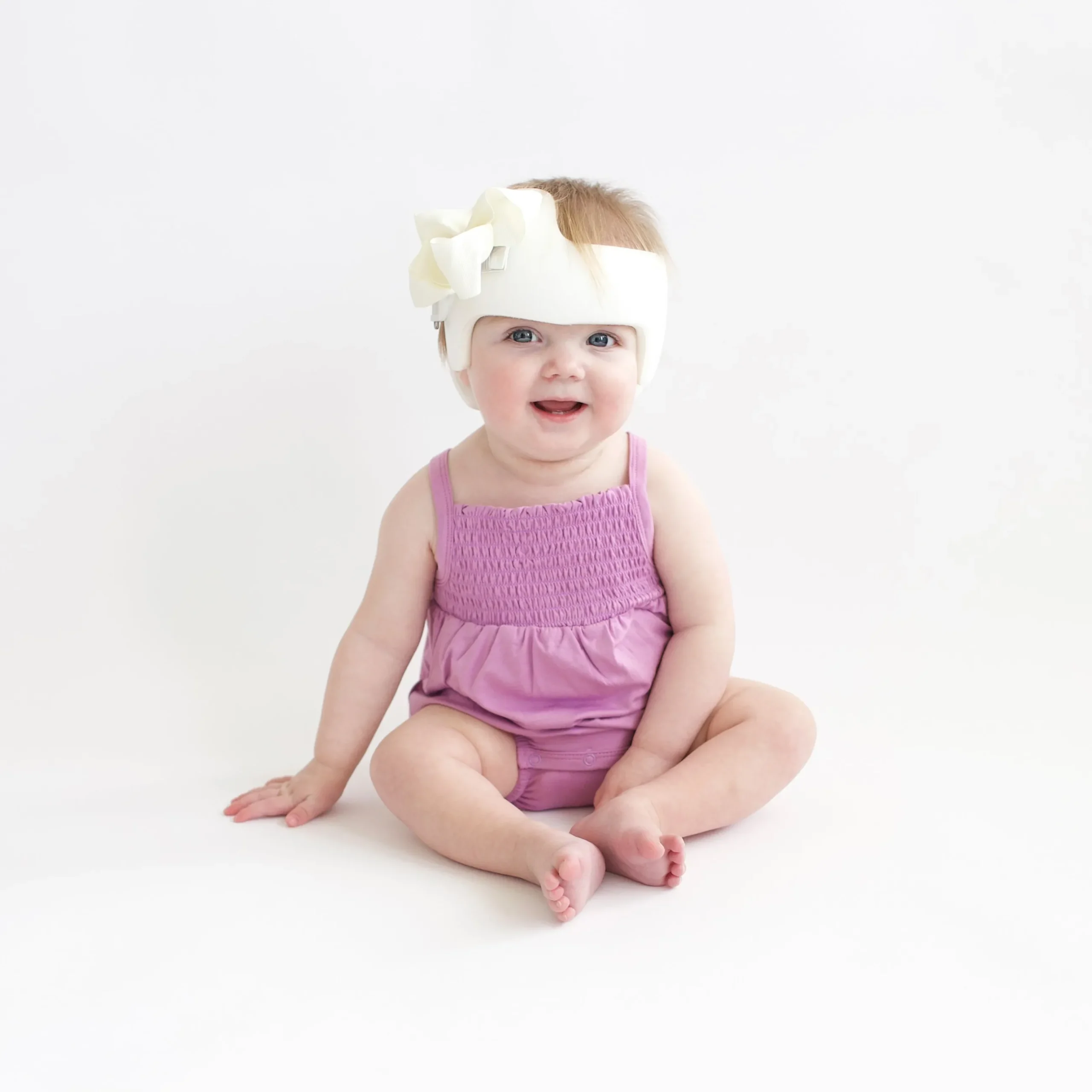 Sale Kyte Baby Smocked Bubble Romper in Poi