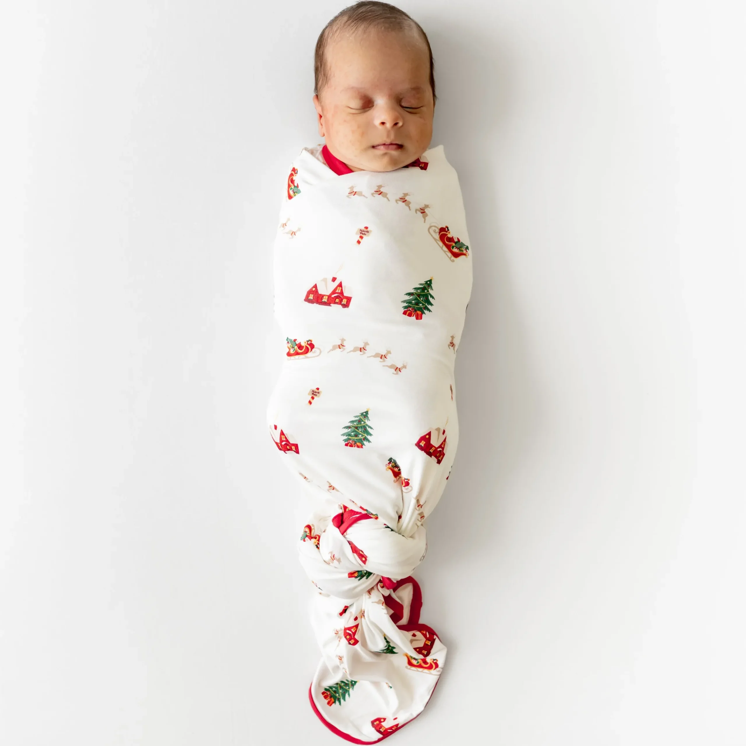 Clearance Kyte Baby Swaddle Blanket in Santa Sleigh