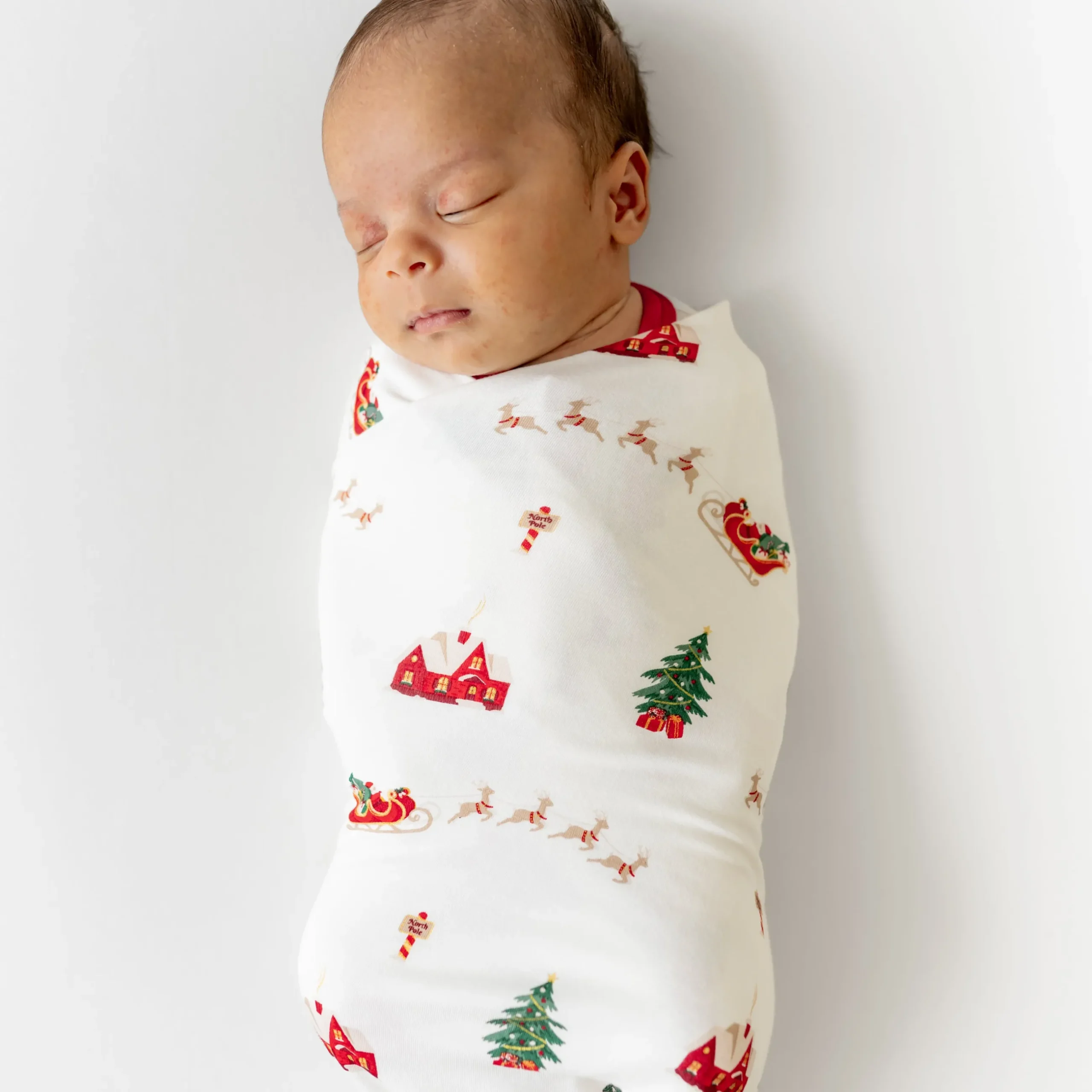 Clearance Kyte Baby Swaddle Blanket in Santa Sleigh