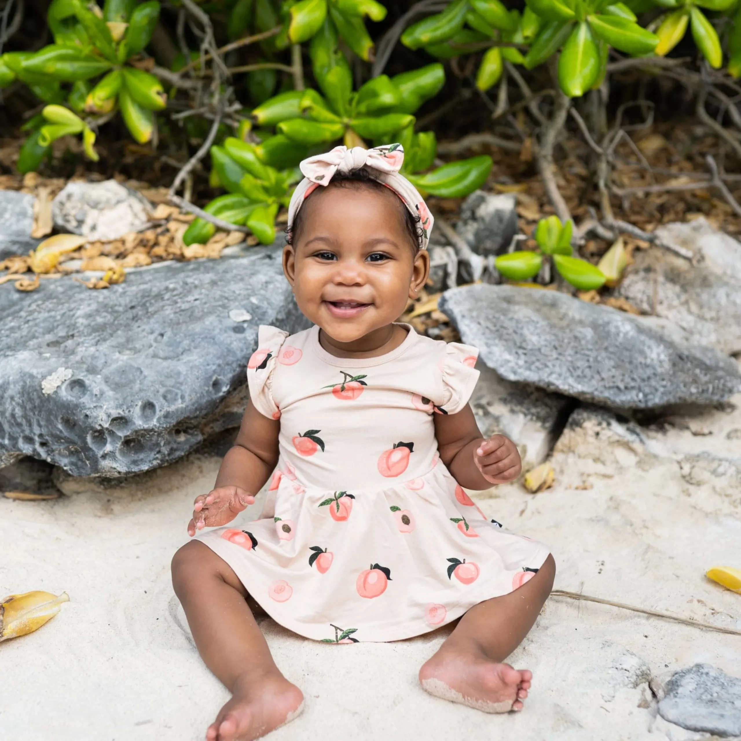 New Kyte Baby Twirl Bodysuit Dress in Peach