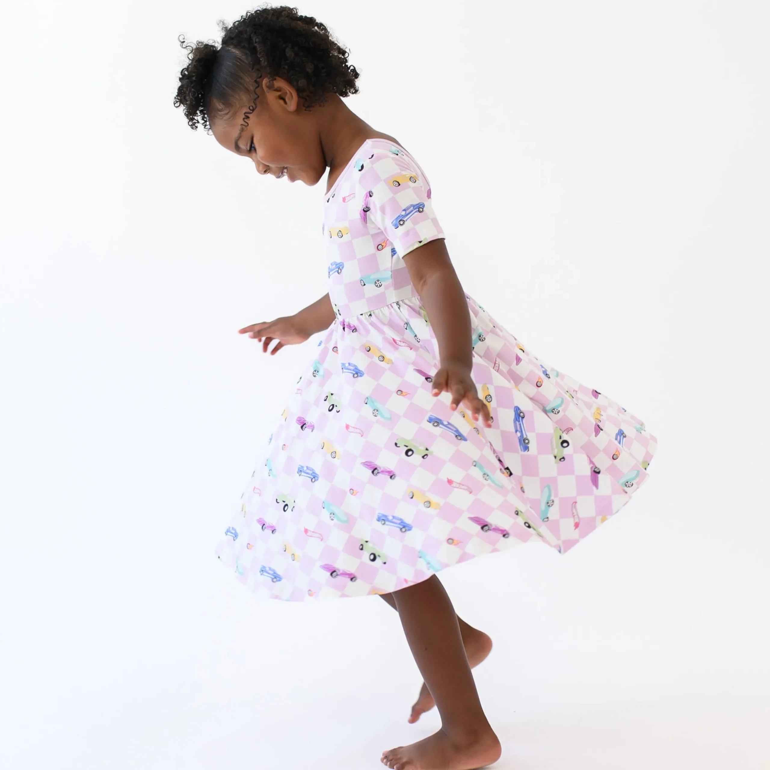 Kyte Baby Twirl Dress in Sparkles and Speed