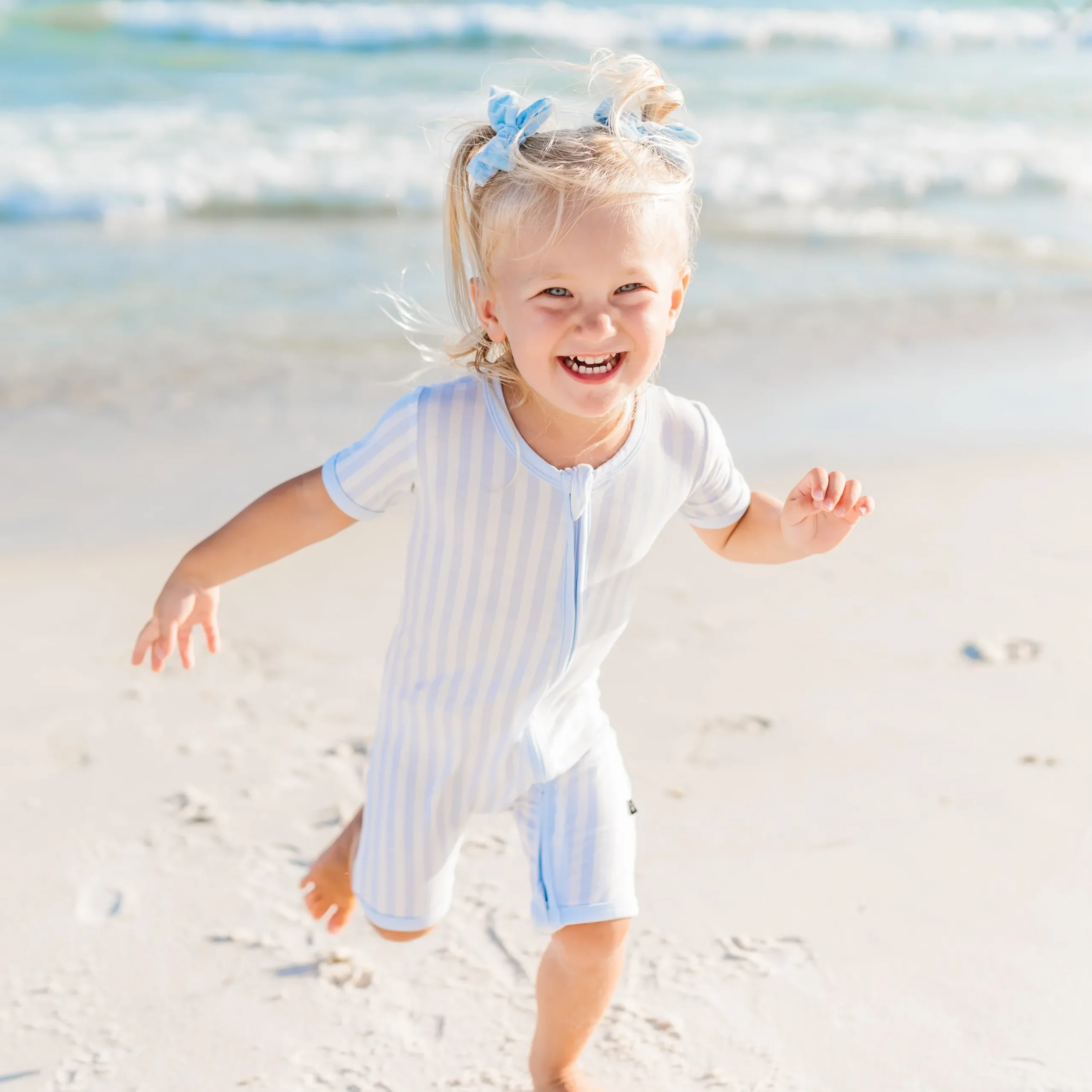 Discount Kyte Baby Zipper Shortall Romper in Small Mist Stripe