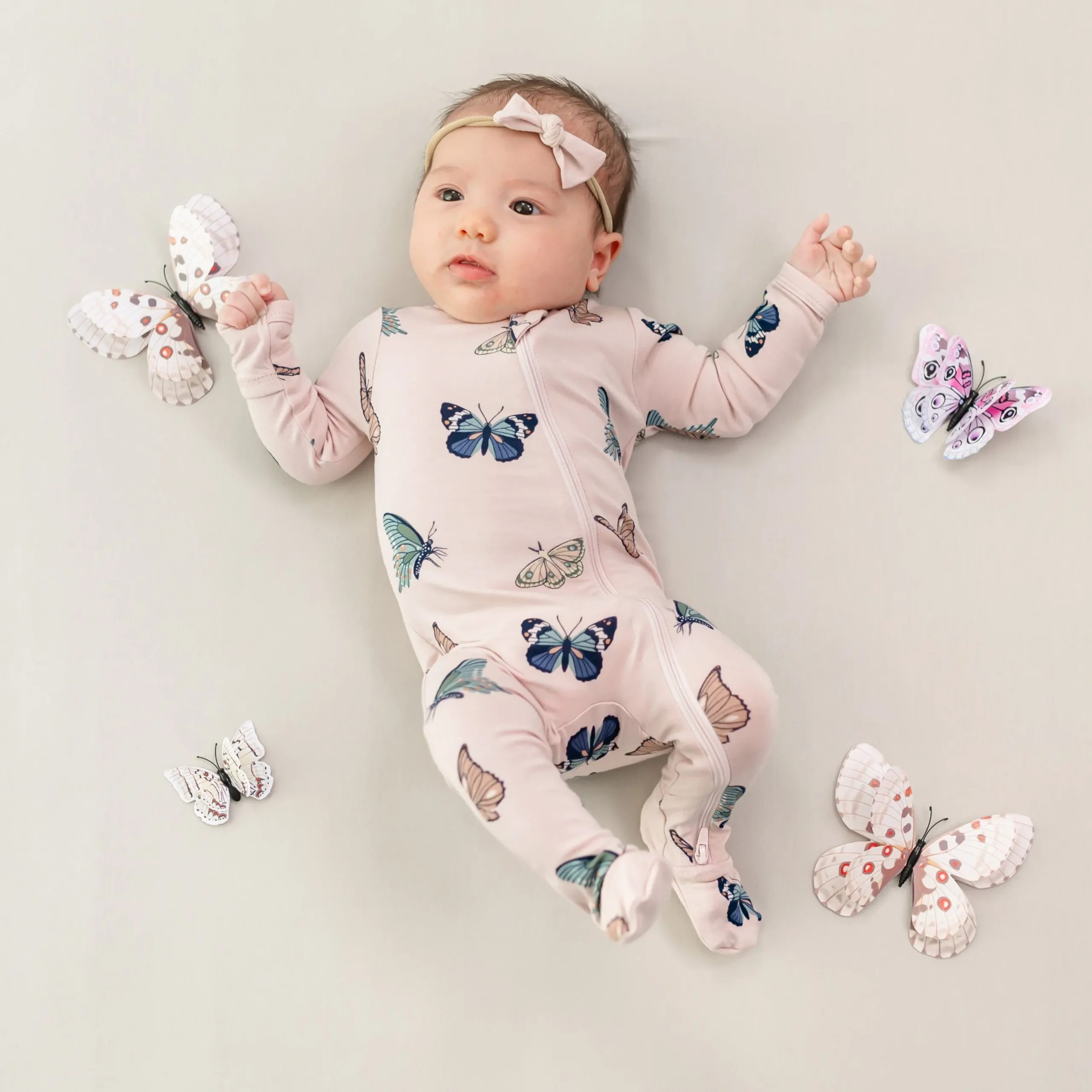 Sale Kyte Baby Zippered Footie in Blush Butterfly