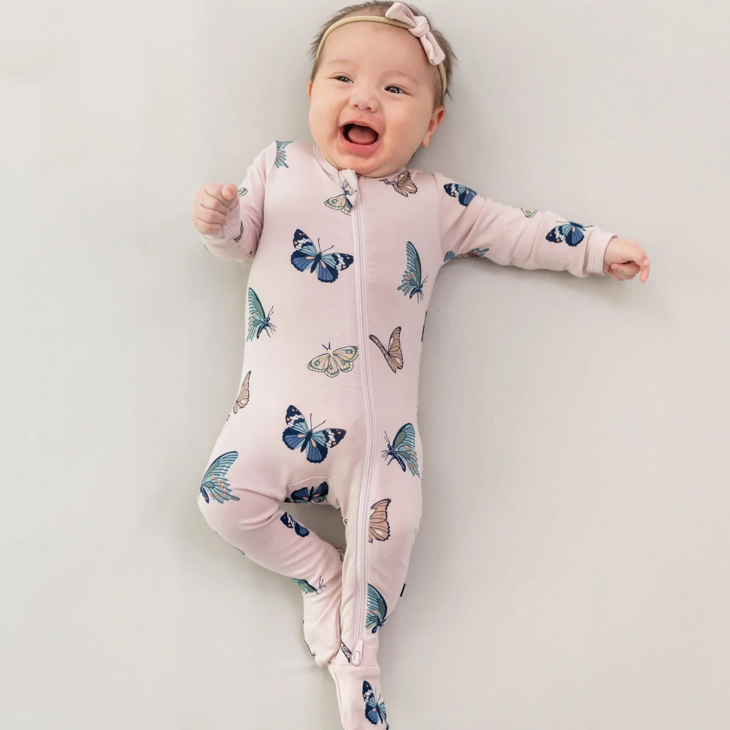 Sale Kyte Baby Zippered Footie in Blush Butterfly
