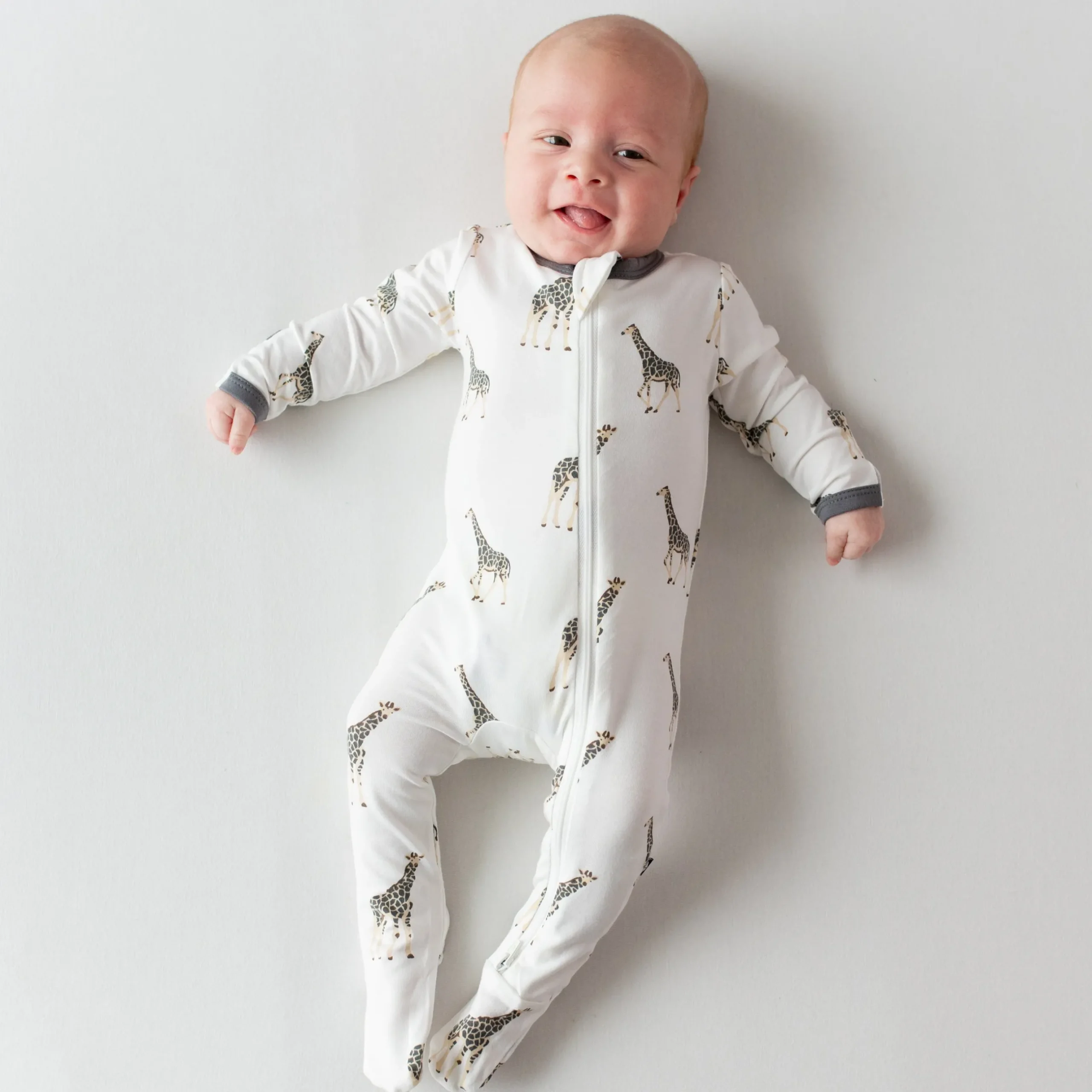 Clearance Kyte Baby Zippered Footie in Giraffe
