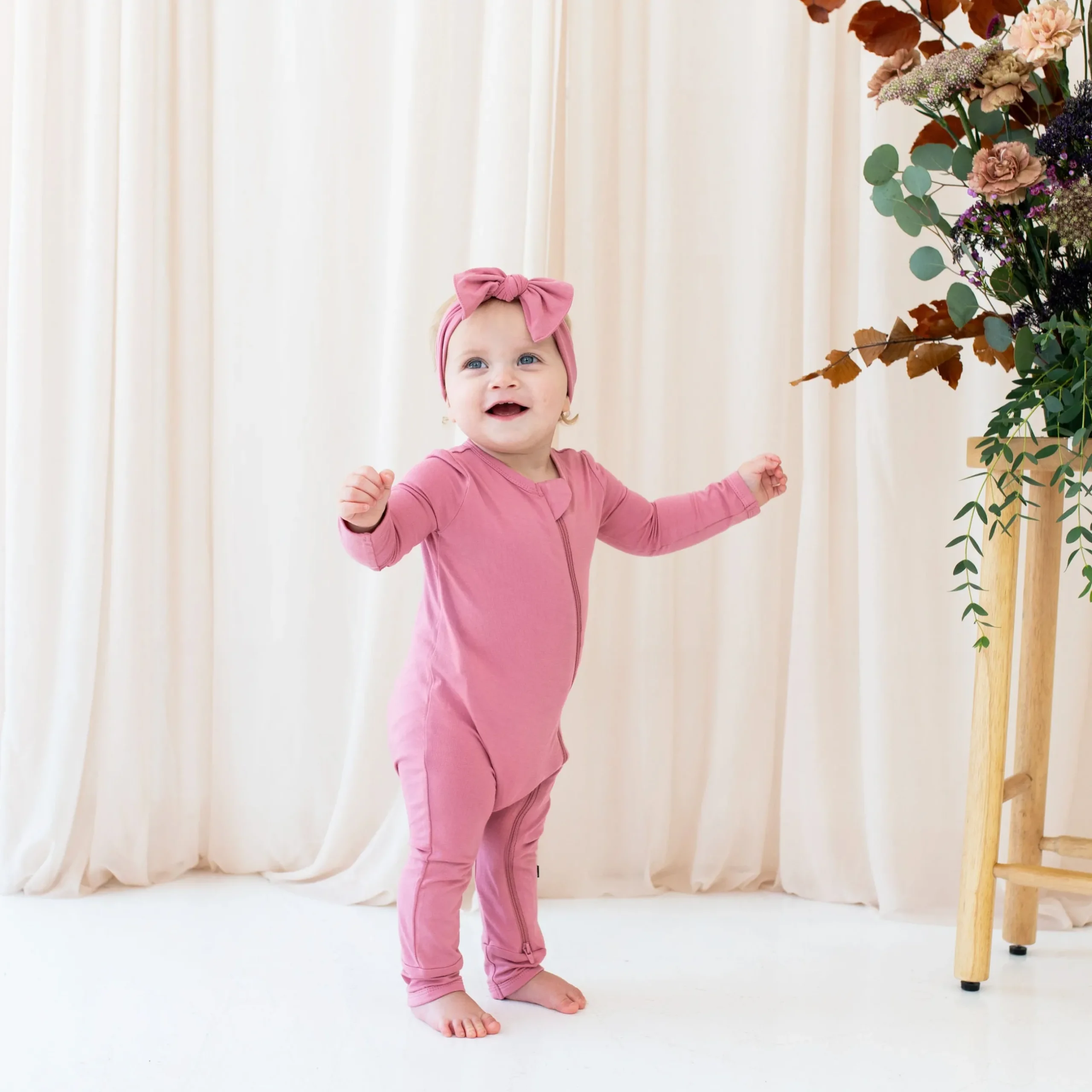 Kyte Baby Zippered Romper in Apple Blossom