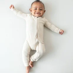 Outlet Kyte Baby Zippered Romper in Bisque
