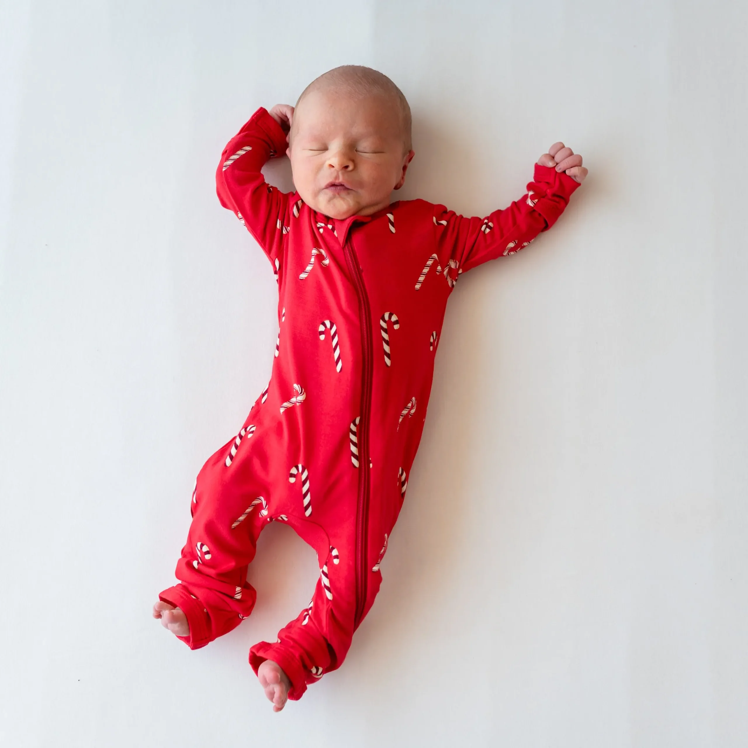 Clearance Kyte Baby Zippered Romper in Candy Cane