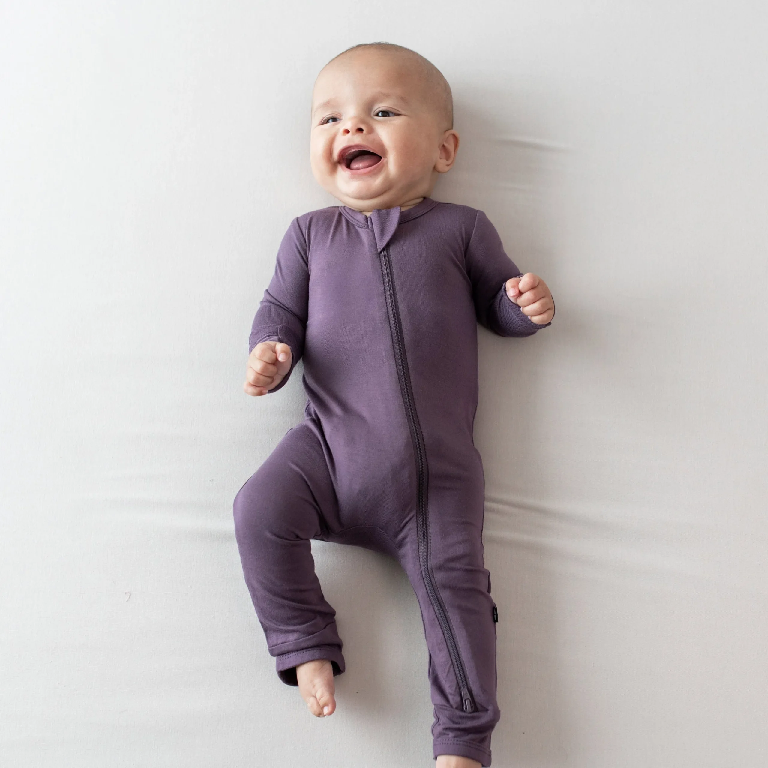 Kyte Baby Zippered Romper in Currant