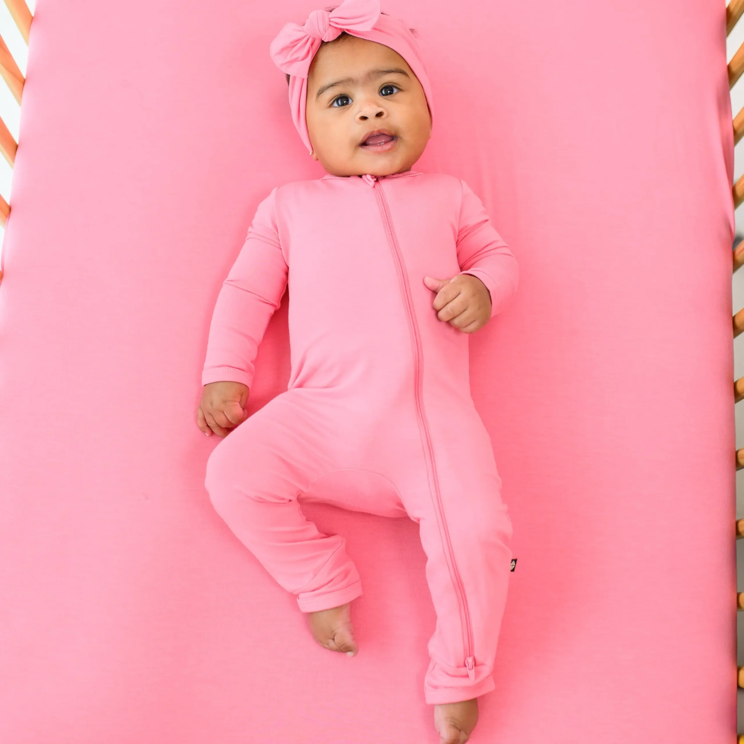 Online Kyte Baby Zippered Romper in Guava