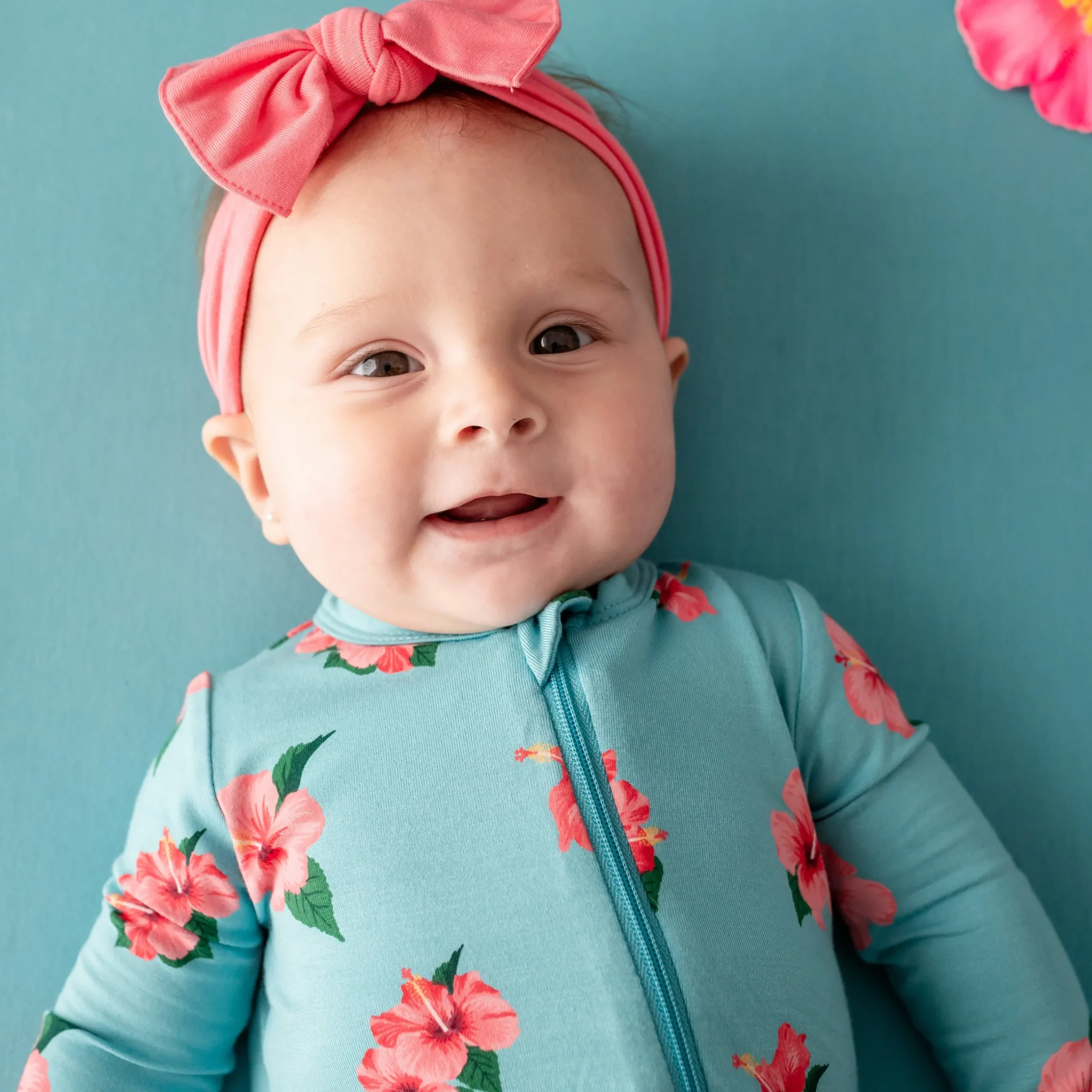 Kyte Baby Zippered Romper in Hibiscus